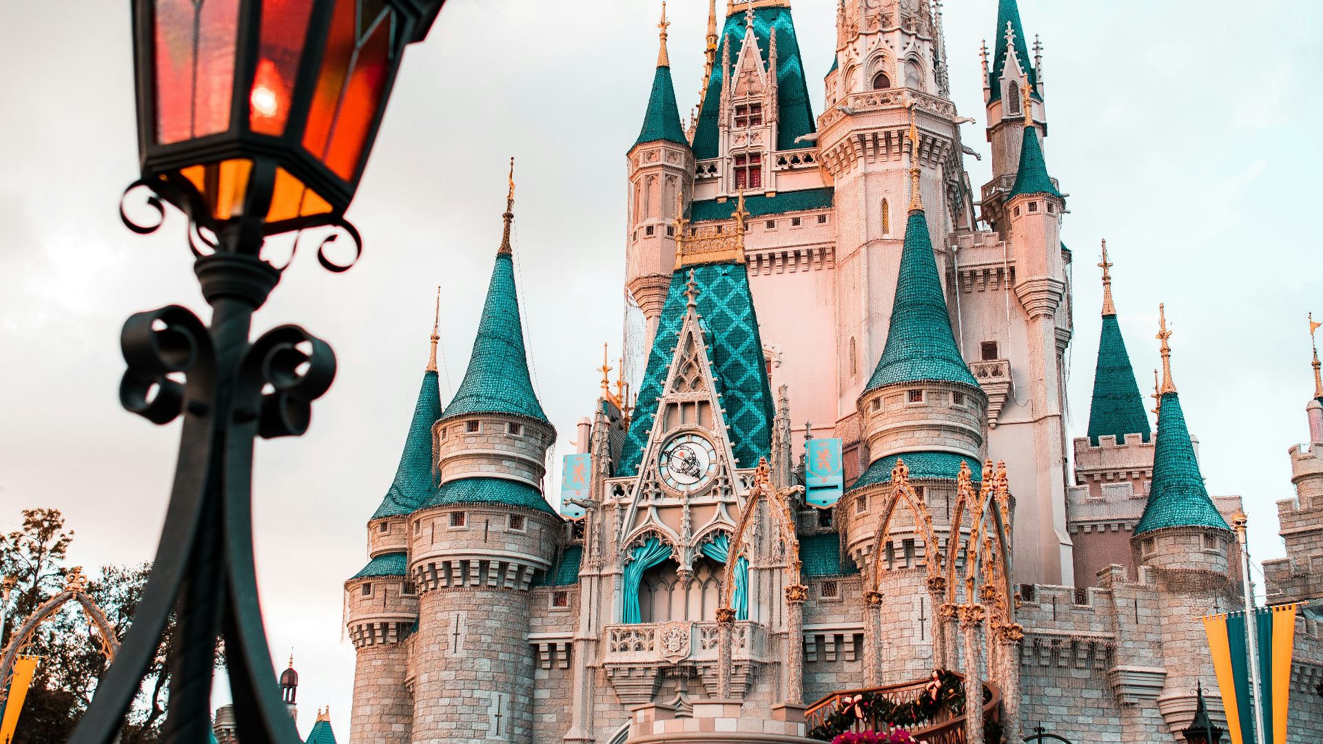 white and blue castle under cloudy sky during daytime
