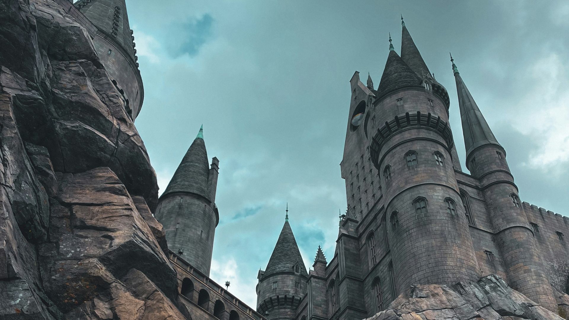 brown and gray concrete castle under cloudy sky during daytime