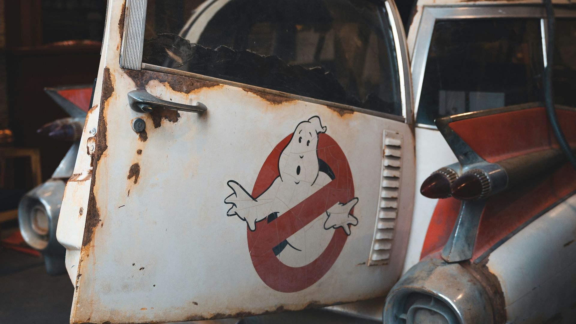 a small truck parked on the side of a building