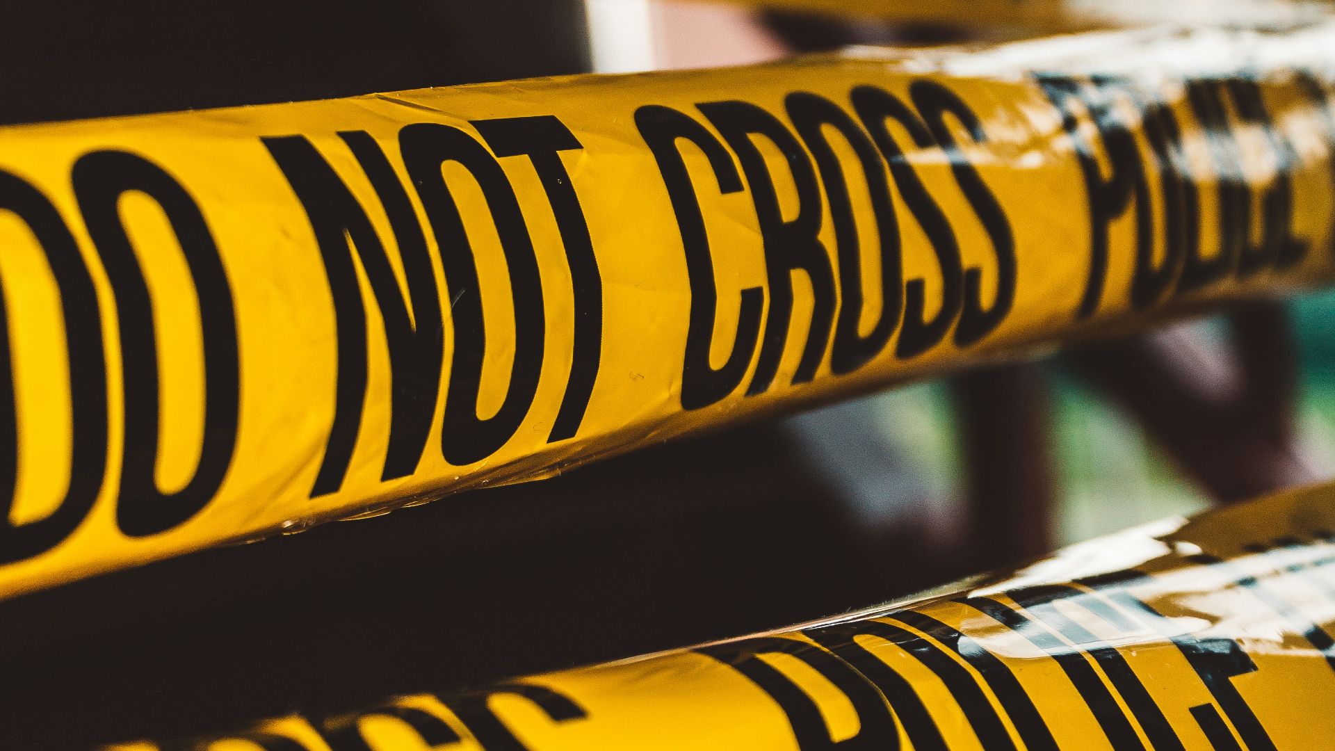 do not cross police barricade tape close-up photography