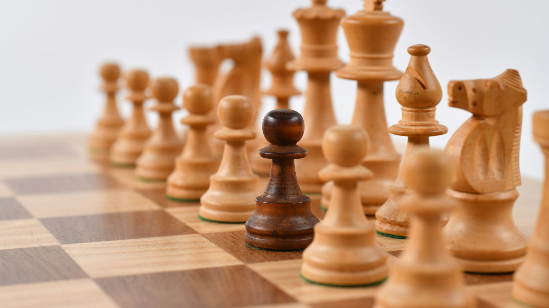 selective focus photography of chess pieces