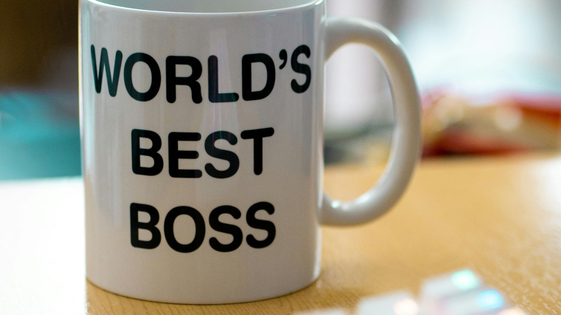 white mug on brown surface