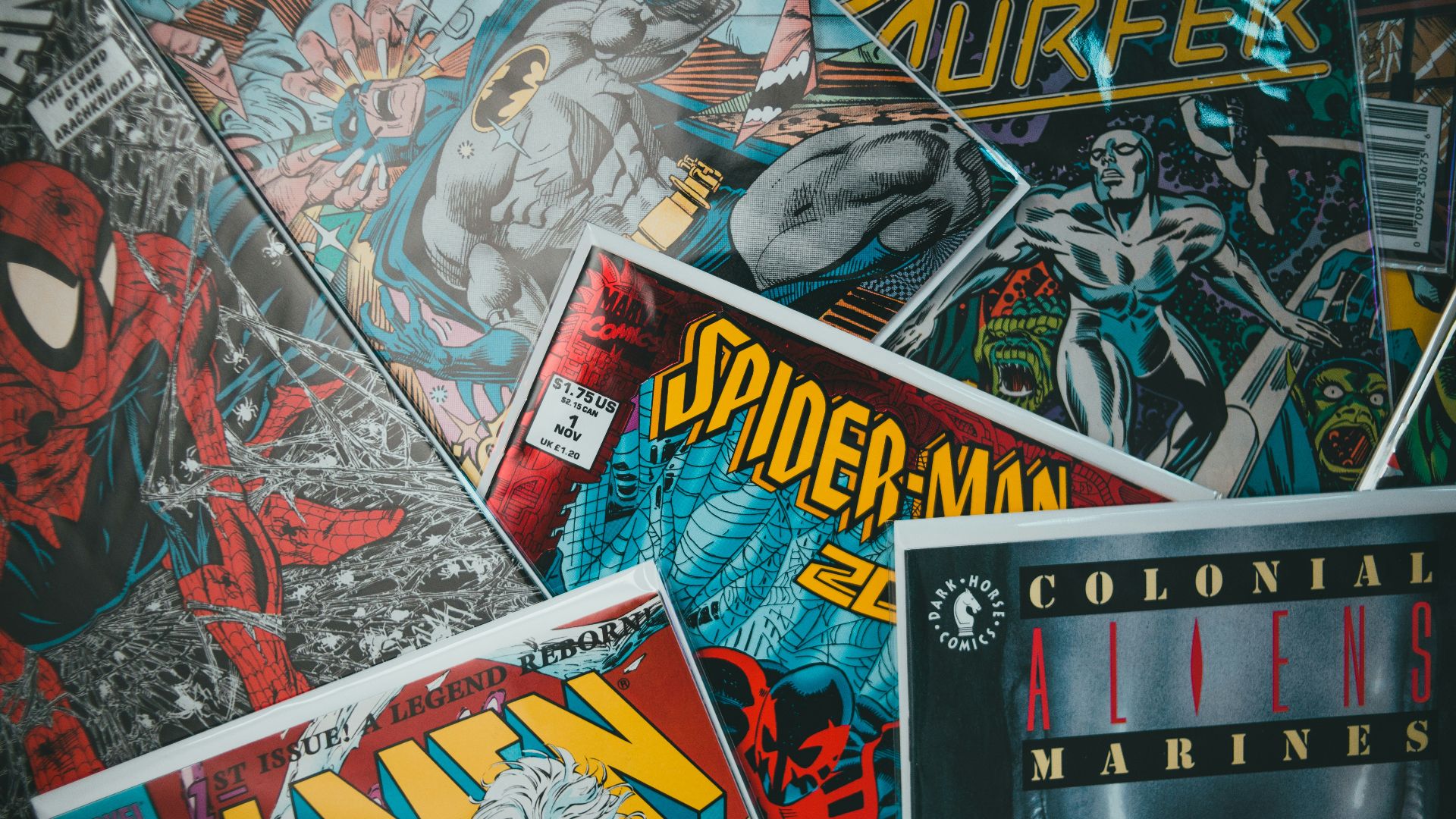 a pile of comics sitting next to each other