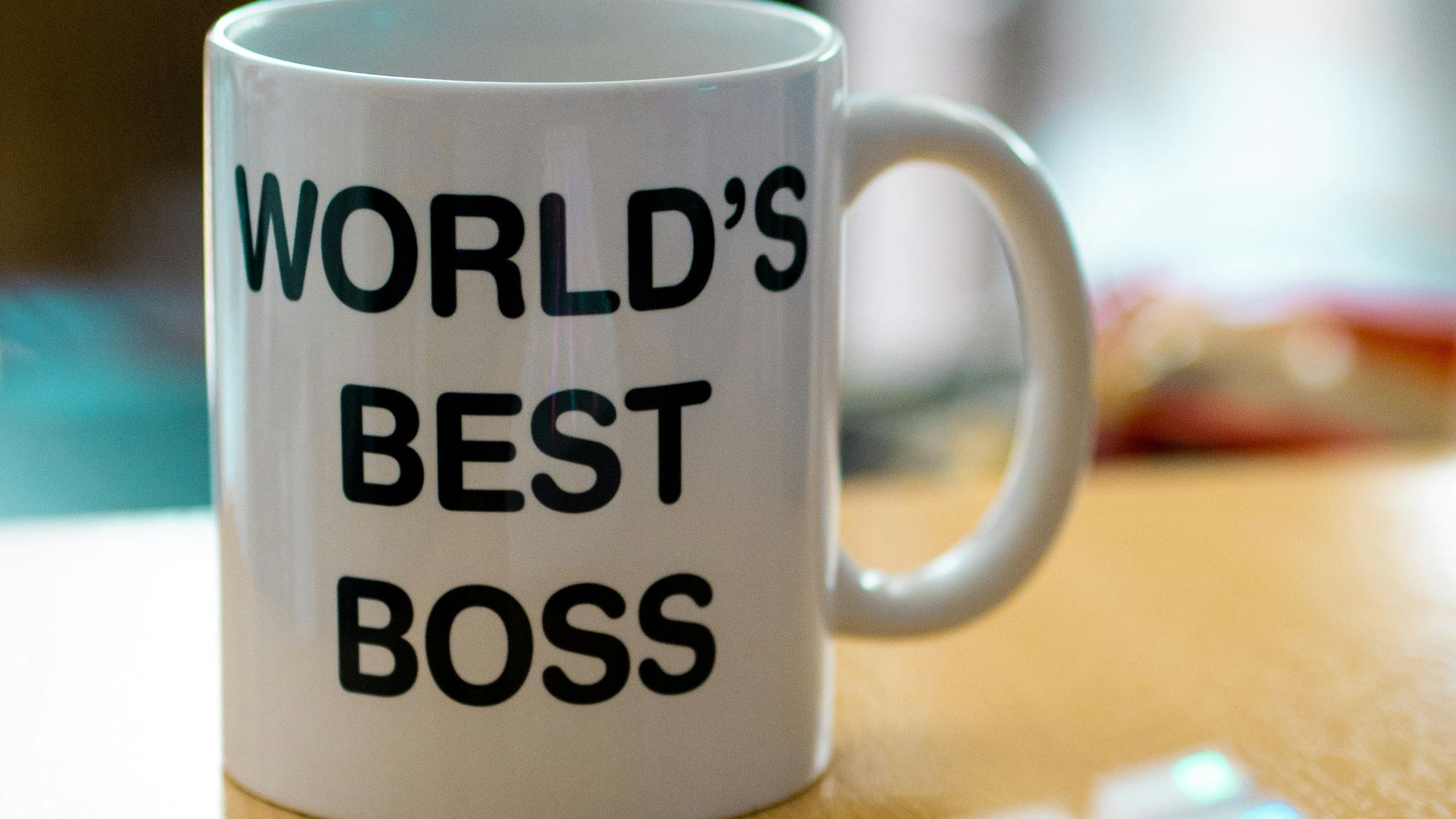 white mug on brown surface