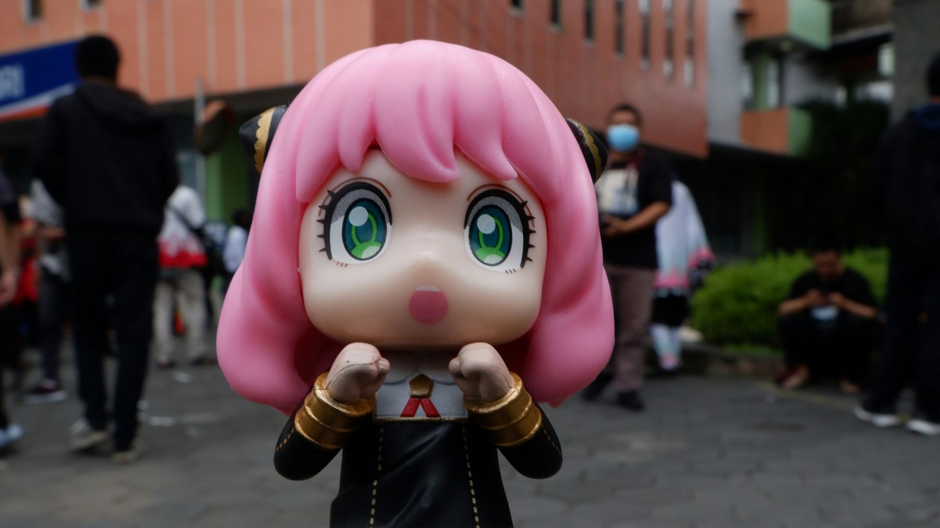 a close up of a figurine on a red object