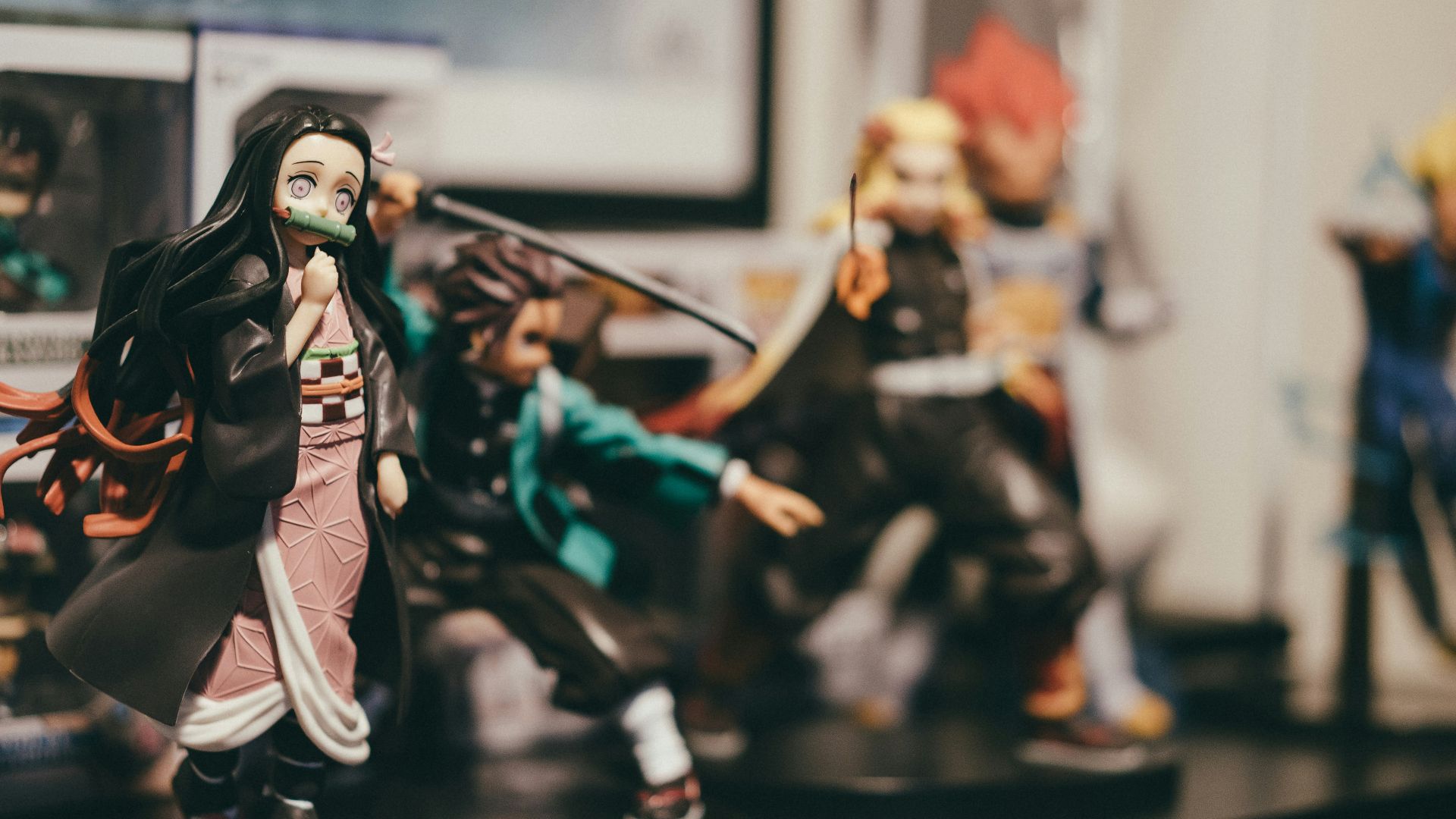 black haired woman in white and red dress figurine