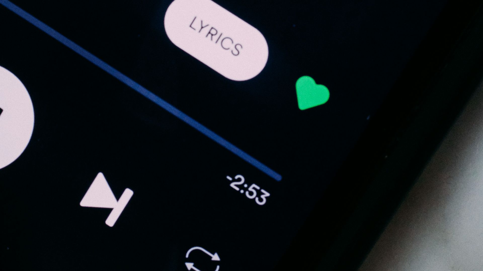 black remote control on white textile