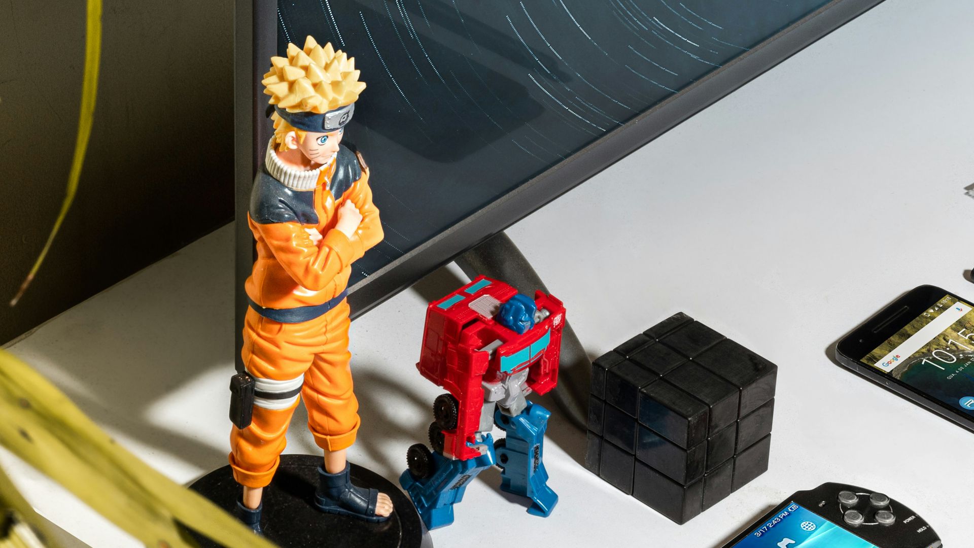 black iphone 4 on white table