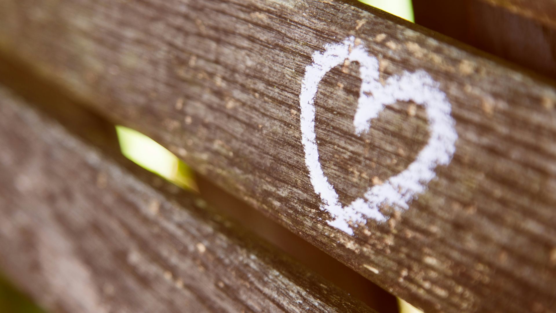 brown wooden panel with white heart