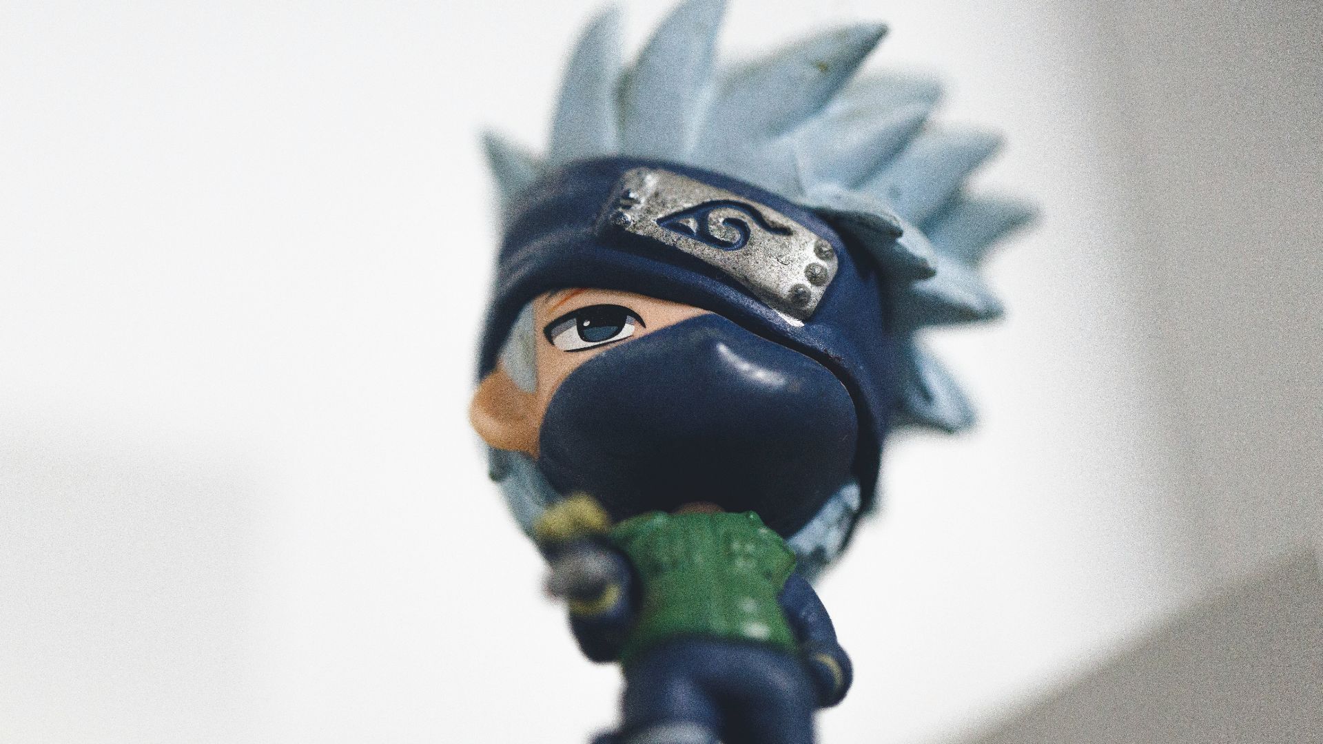 a figurine of a person with a hat on