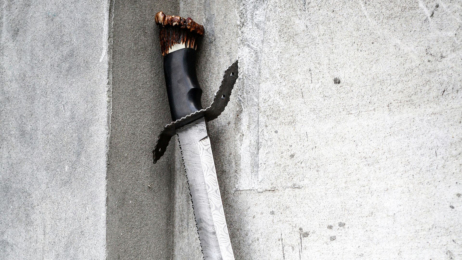 black and white rope on white concrete wall