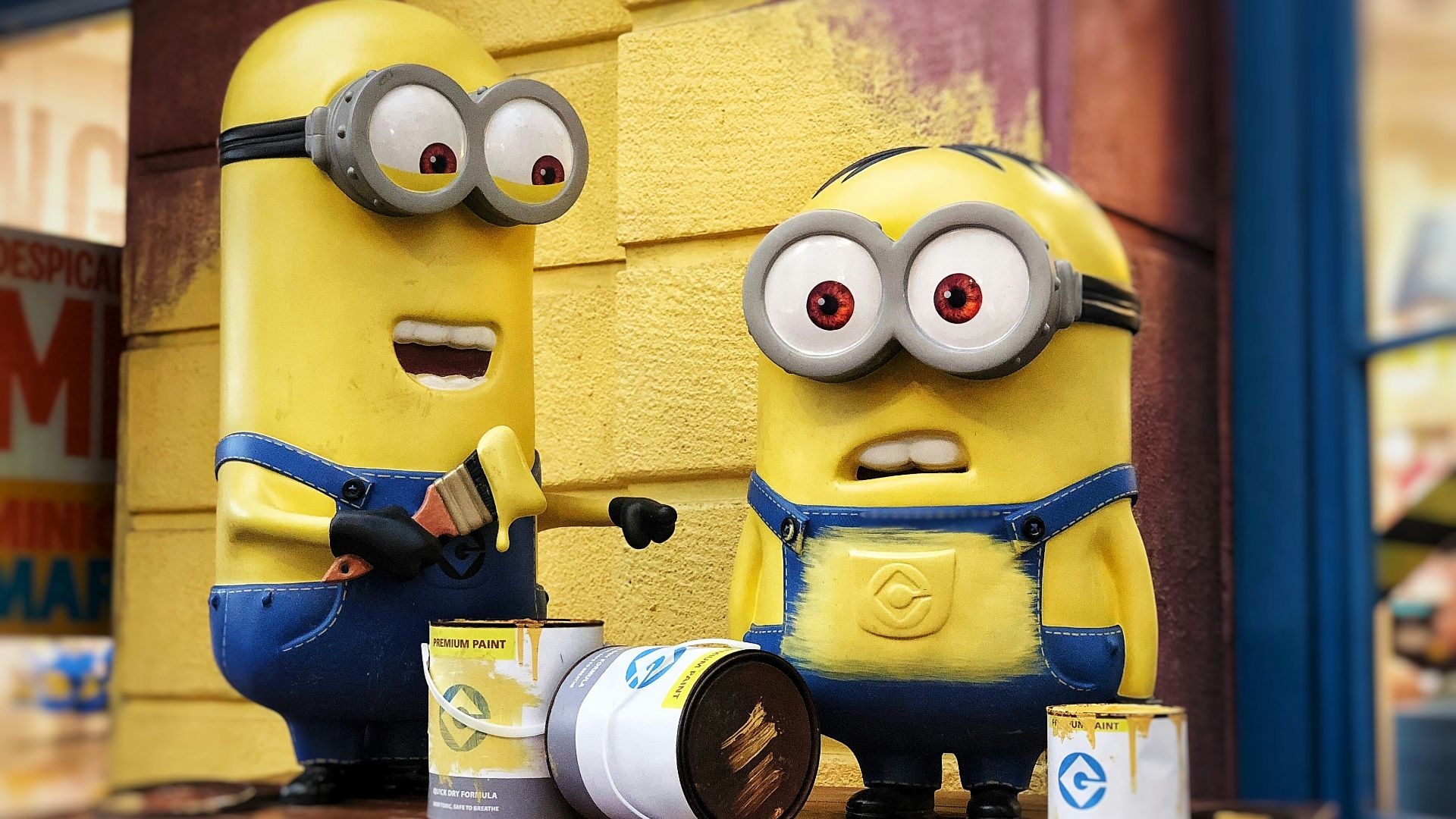 two Minions character figure on red table