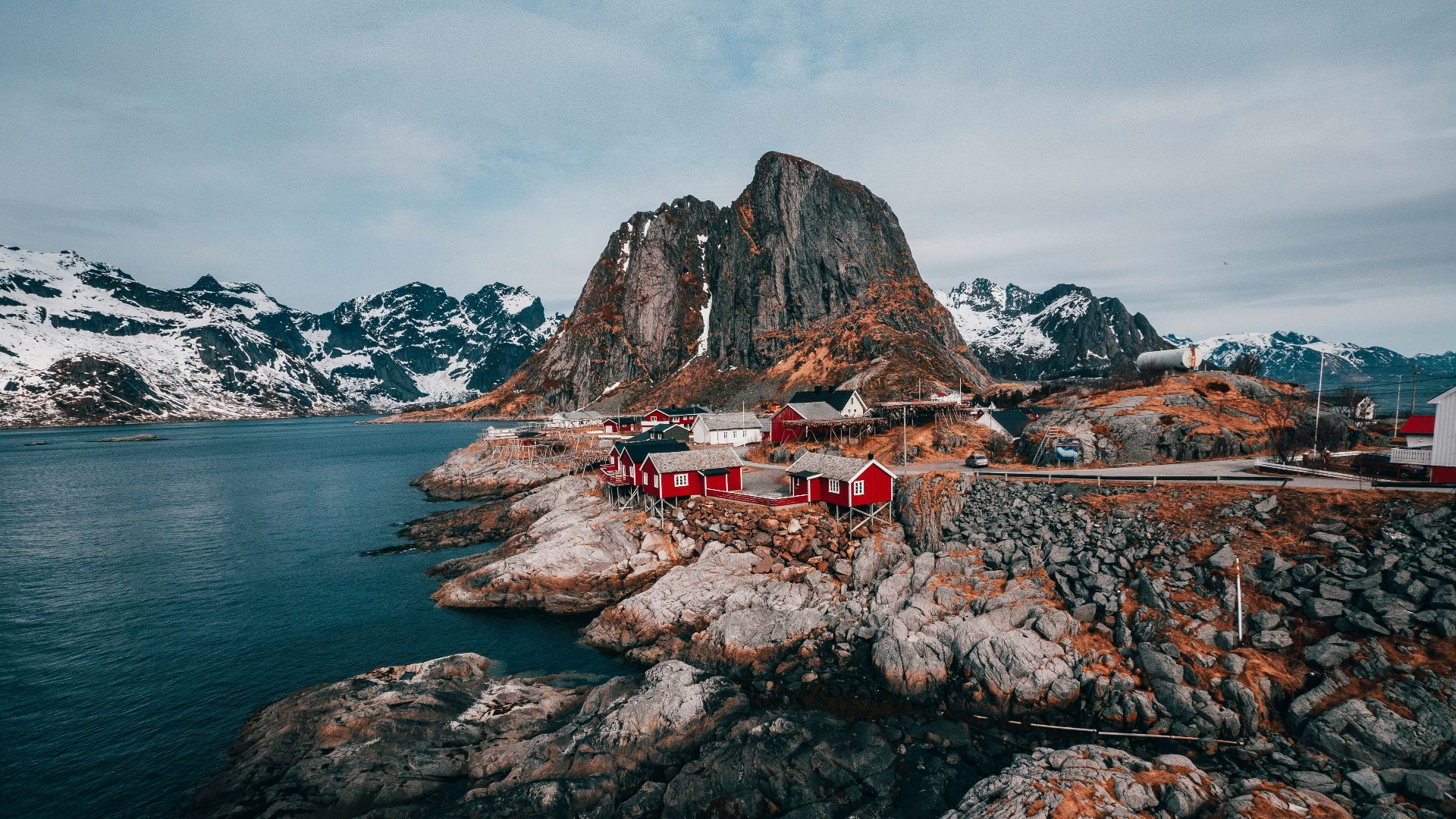 aerial view of body of water near rock formation
