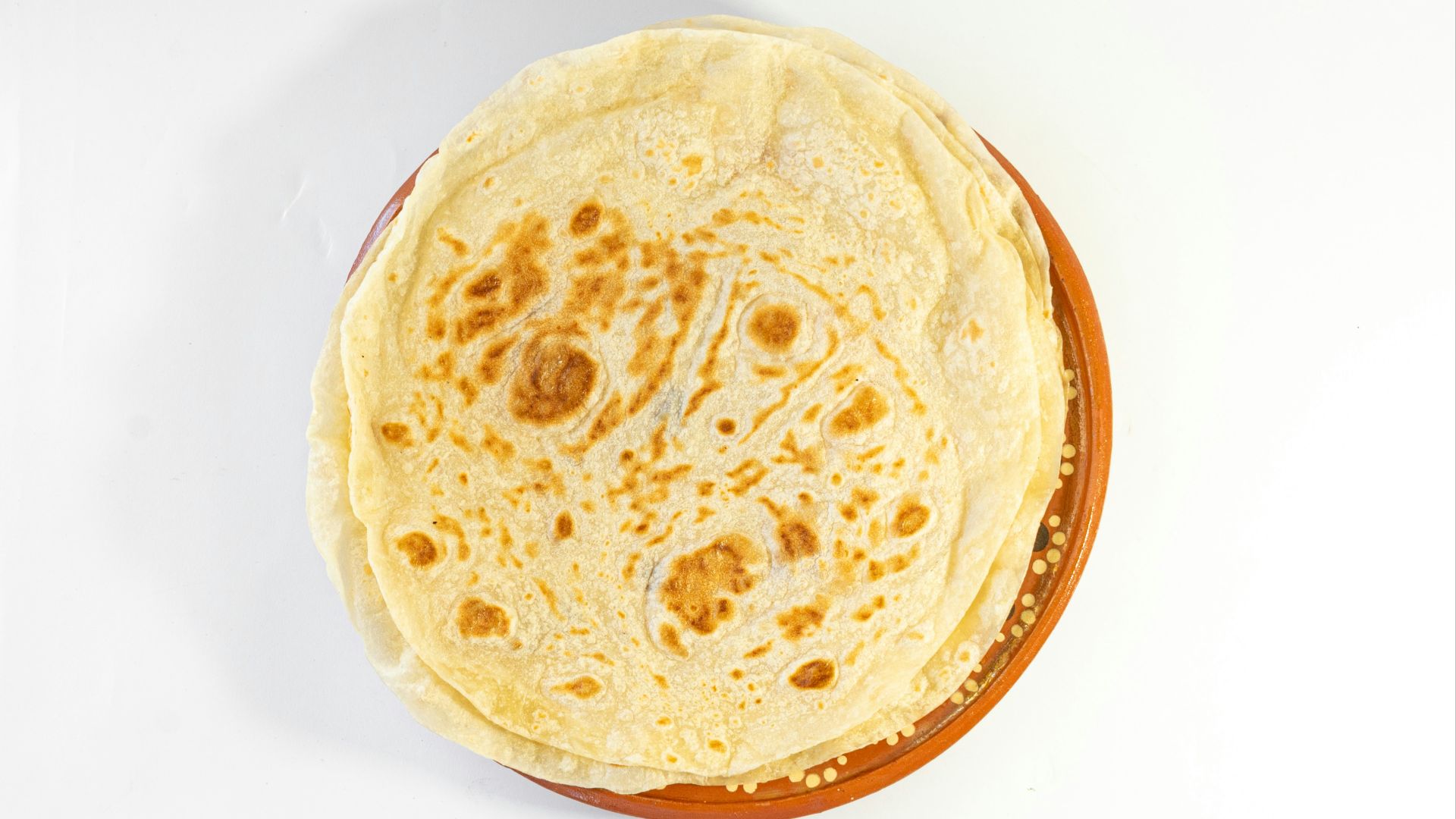 A tortilla sitting on top of a white table