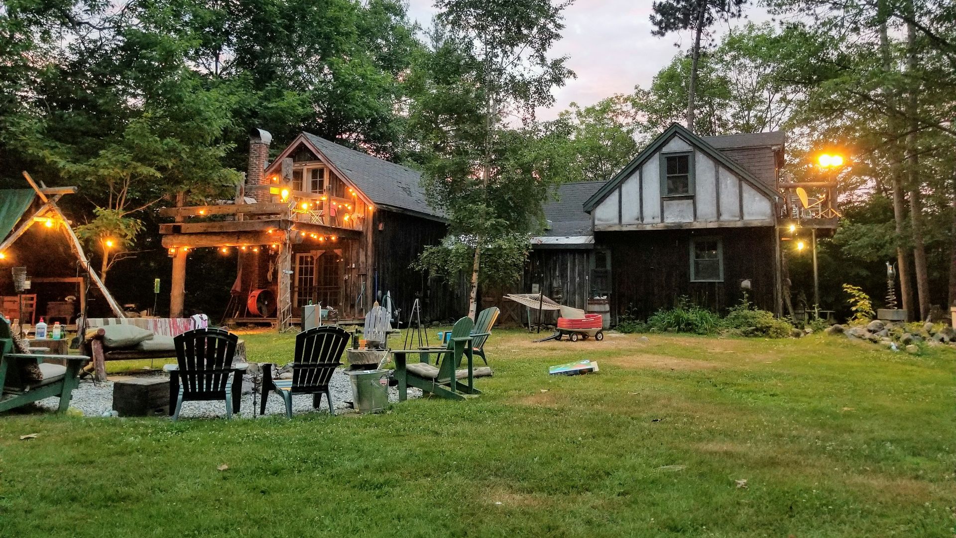 turned-on lights outside houses