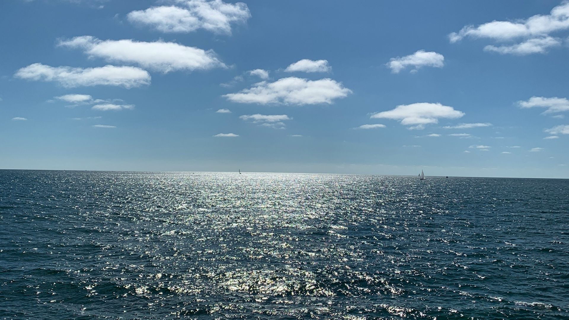 blue sky and white clouds over sea