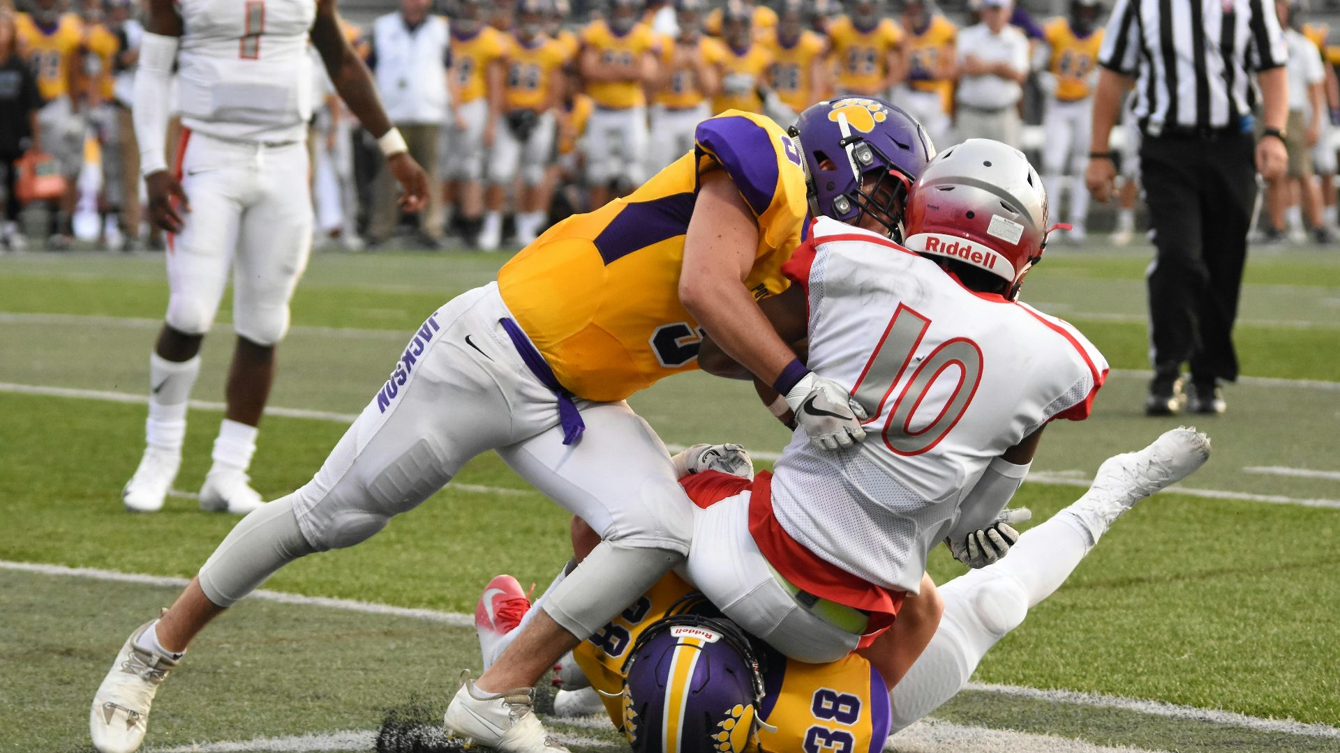 football playing playing on field