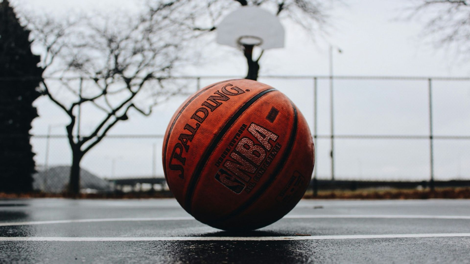 Spalding basketball in court