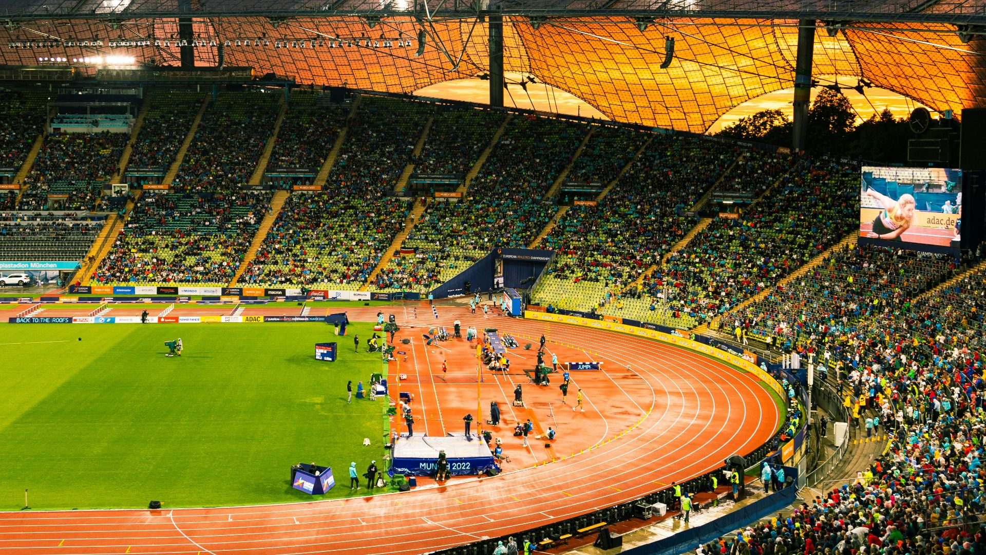 a baseball stadium with a crowd of people in it