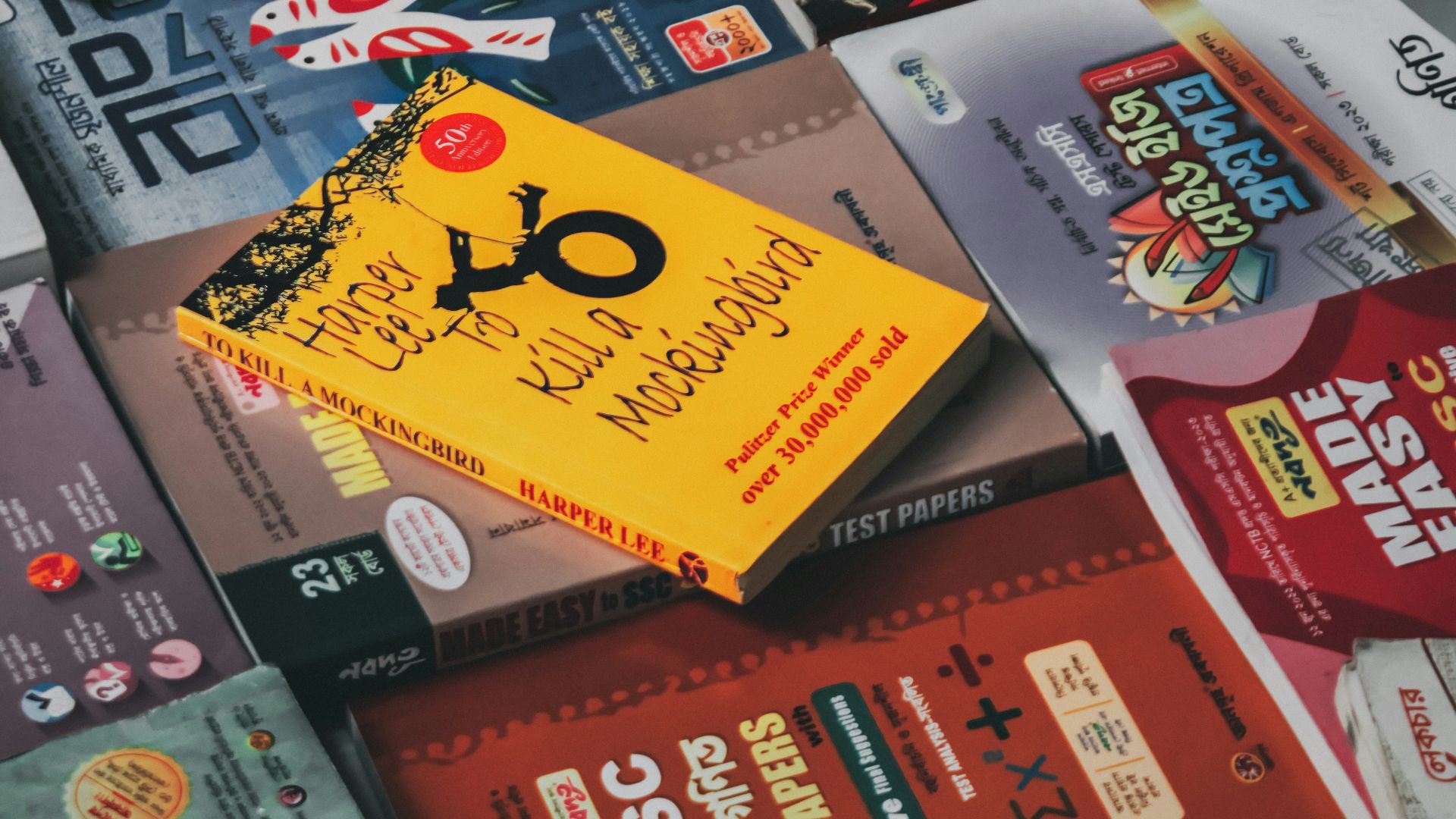 a pile of books sitting on top of each other