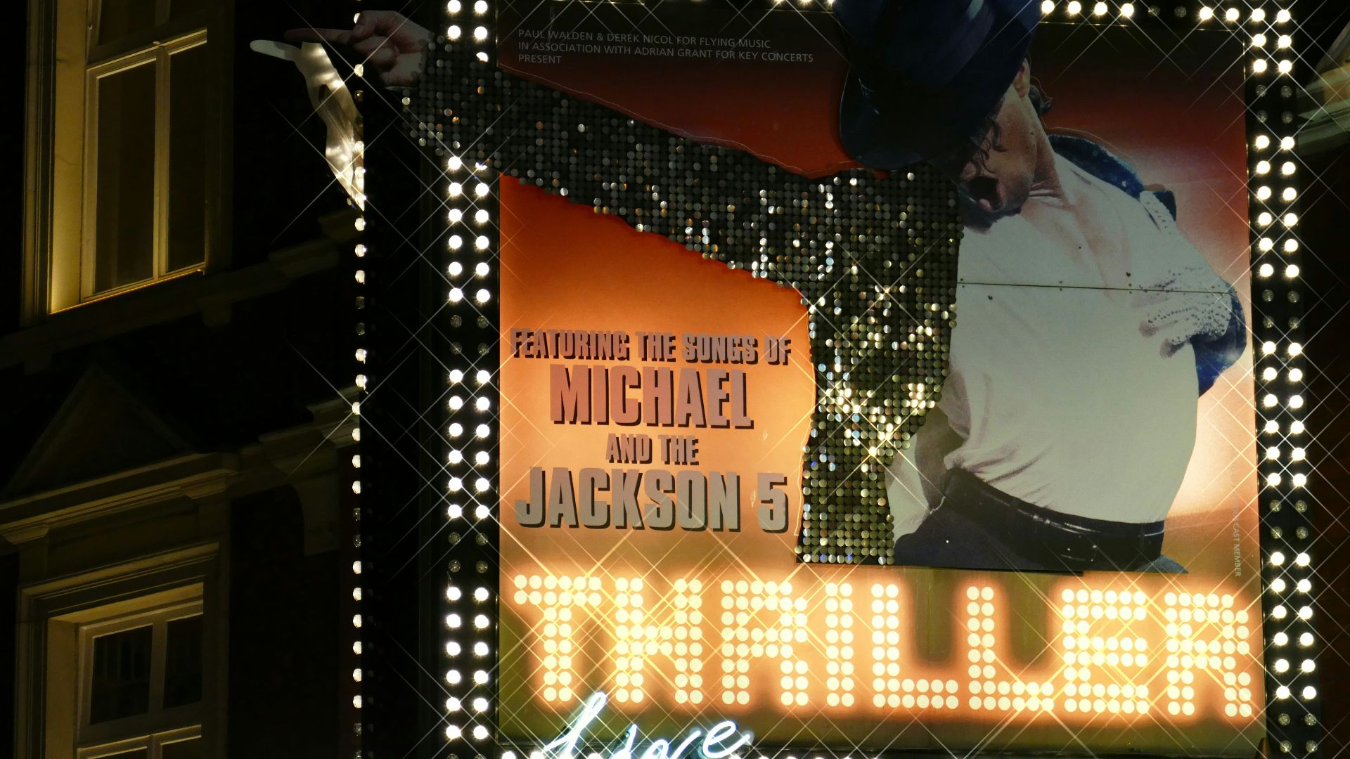 Michael Jackson 5 billboard during nighttime