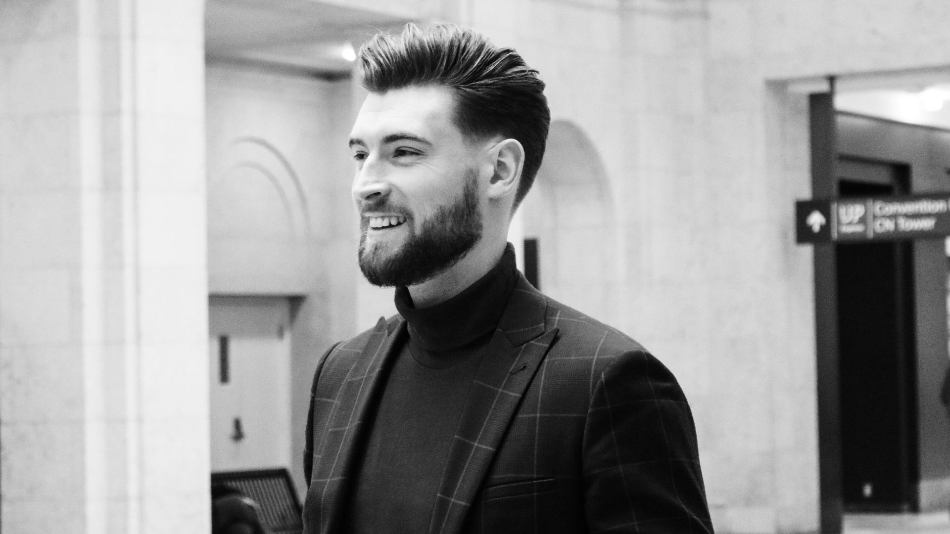 man in black suit jacket