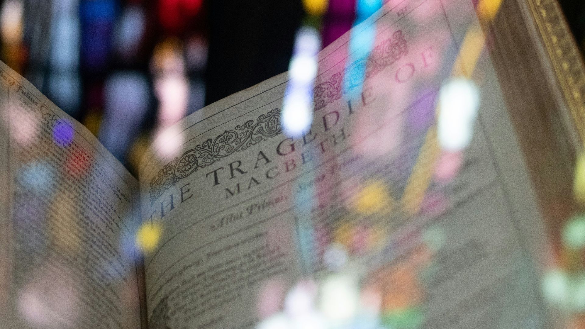a close up of an open book on a table
