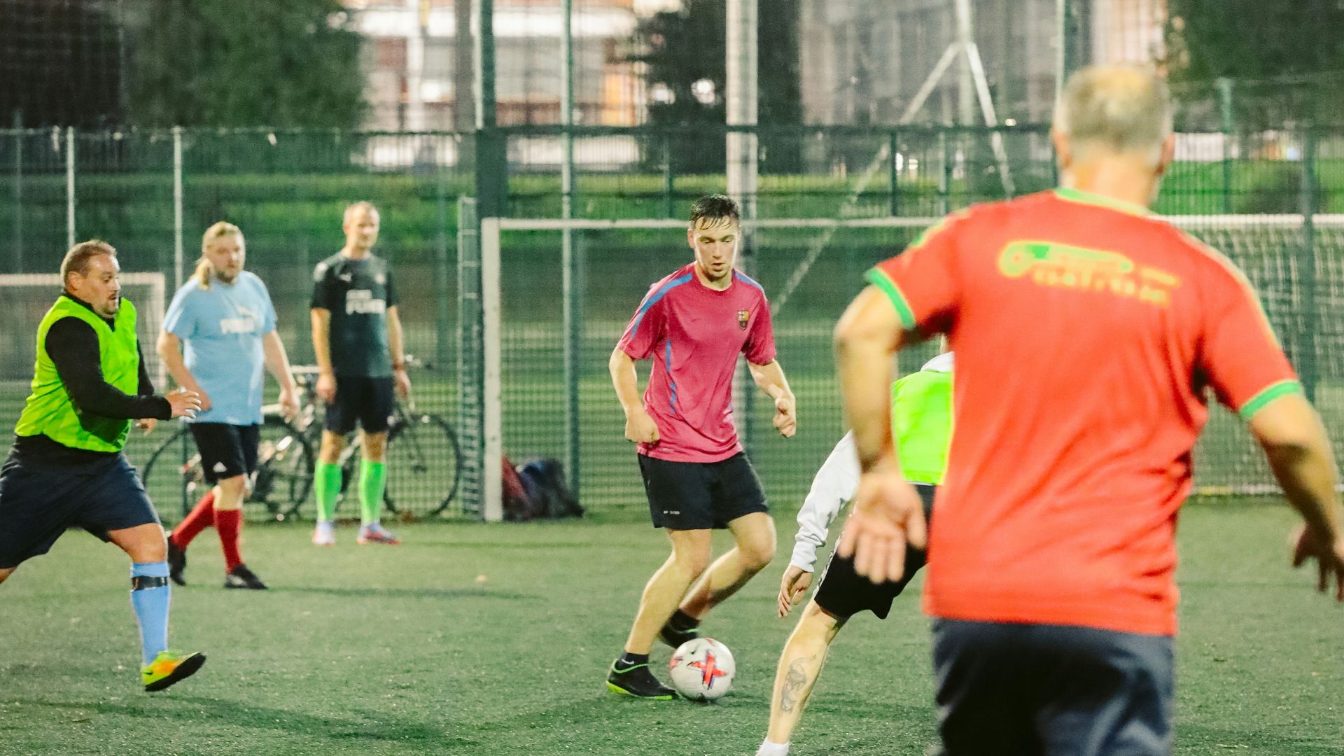 a group of young men playing a game of soccer