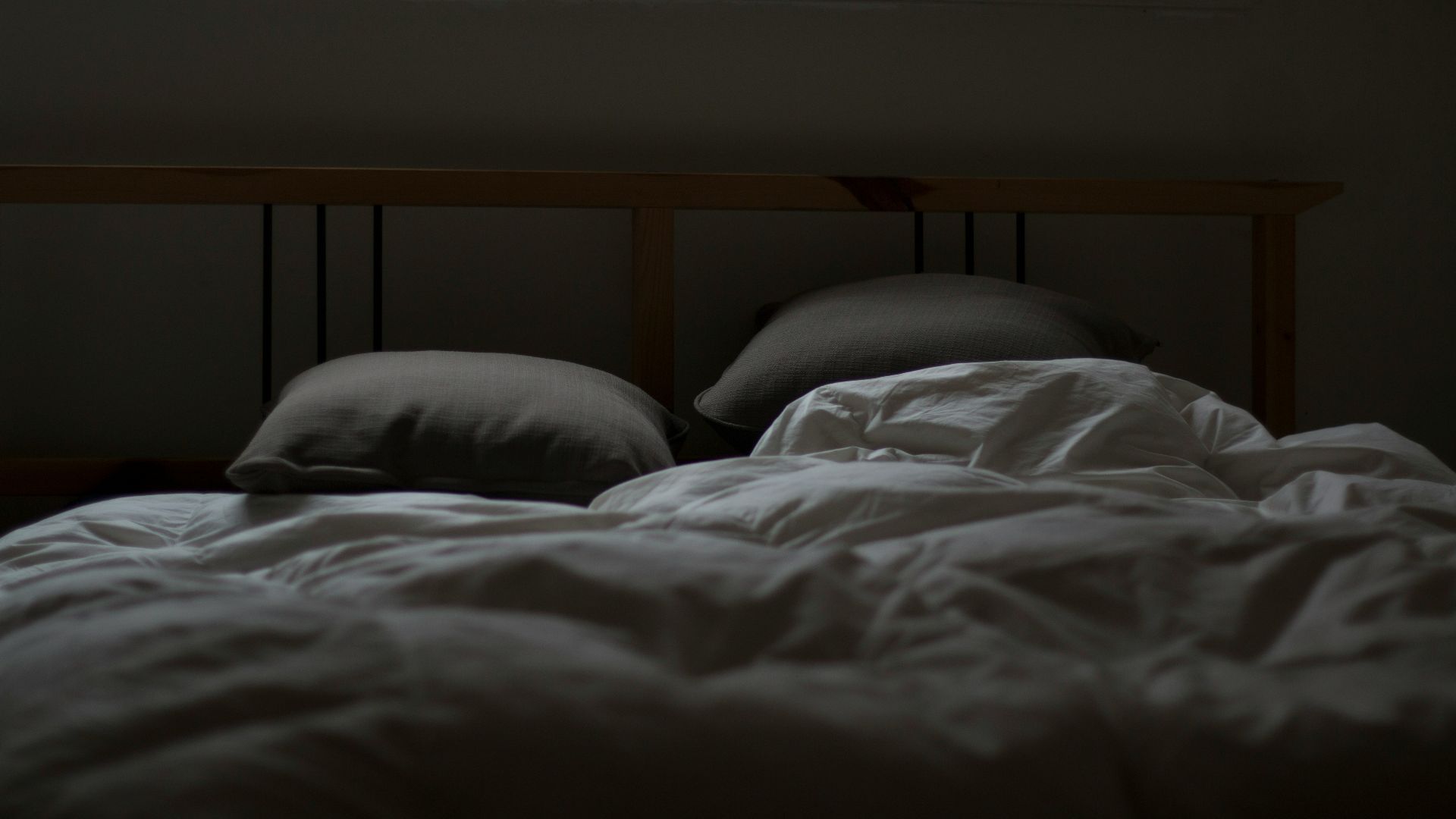 empty white and gray bed set
