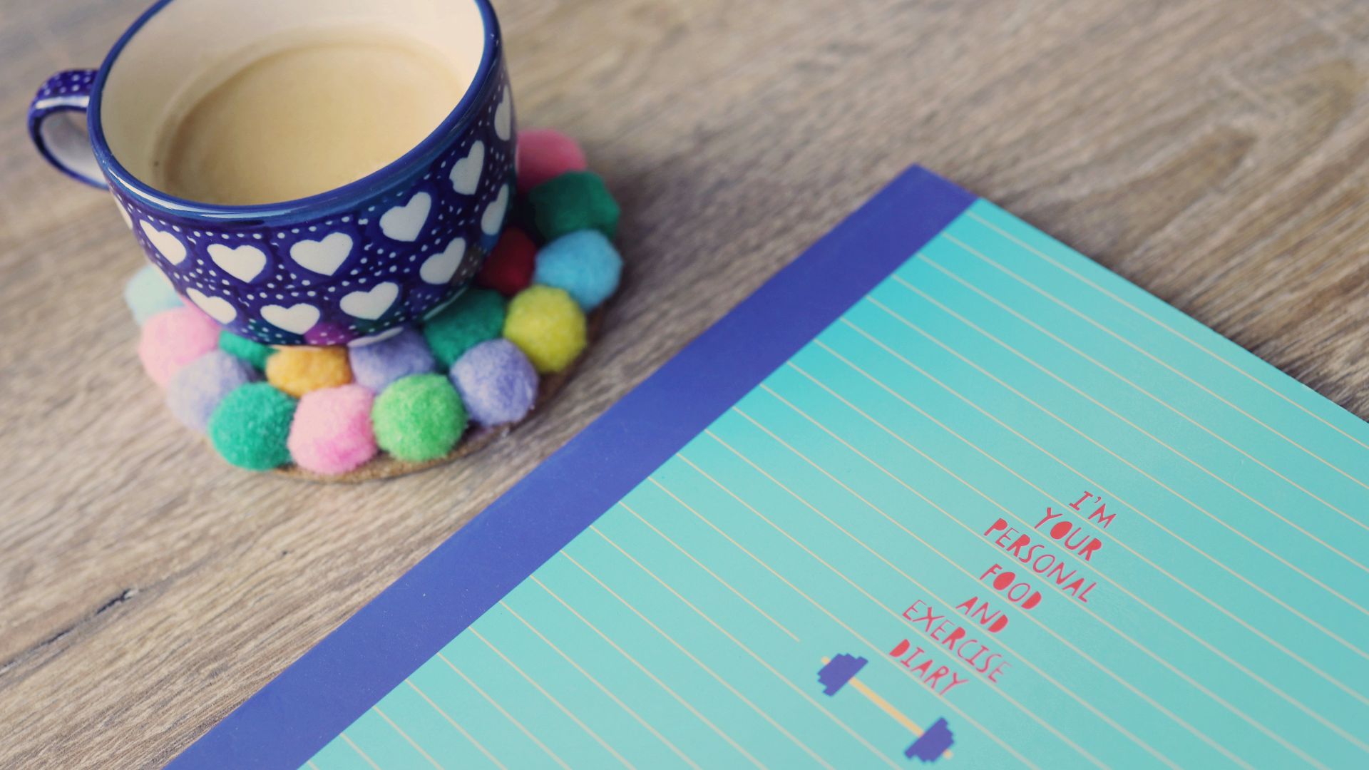 blue ceramic cup on tabletop
