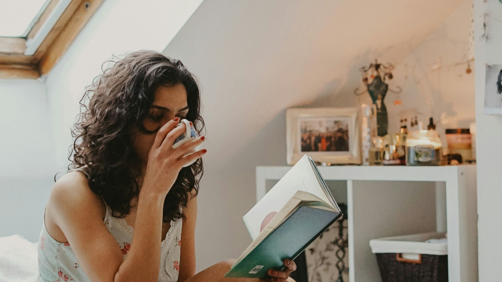 woman holding book