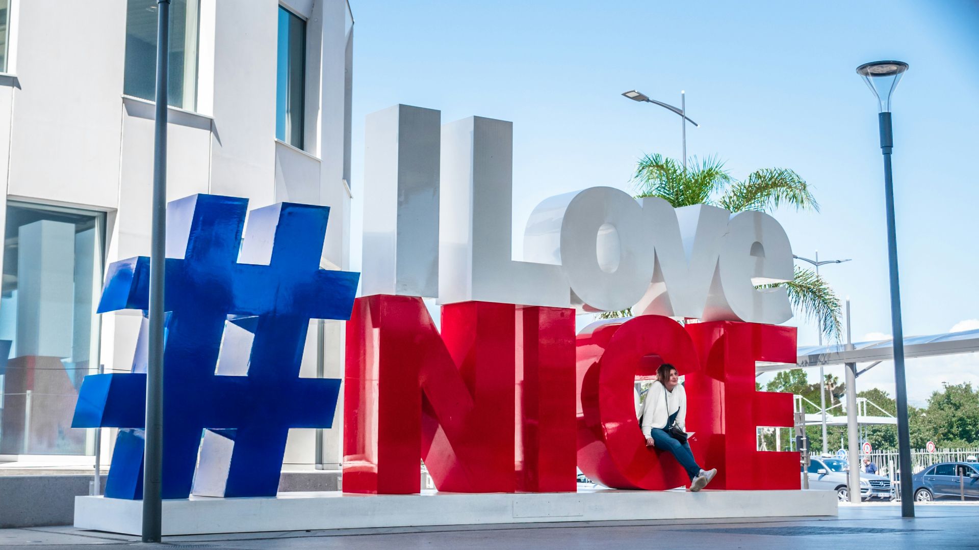 red blue and white cross on street