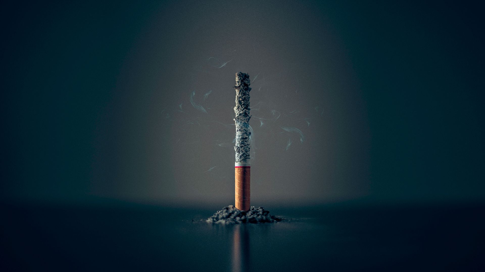 single cigarette stick with ashes stick