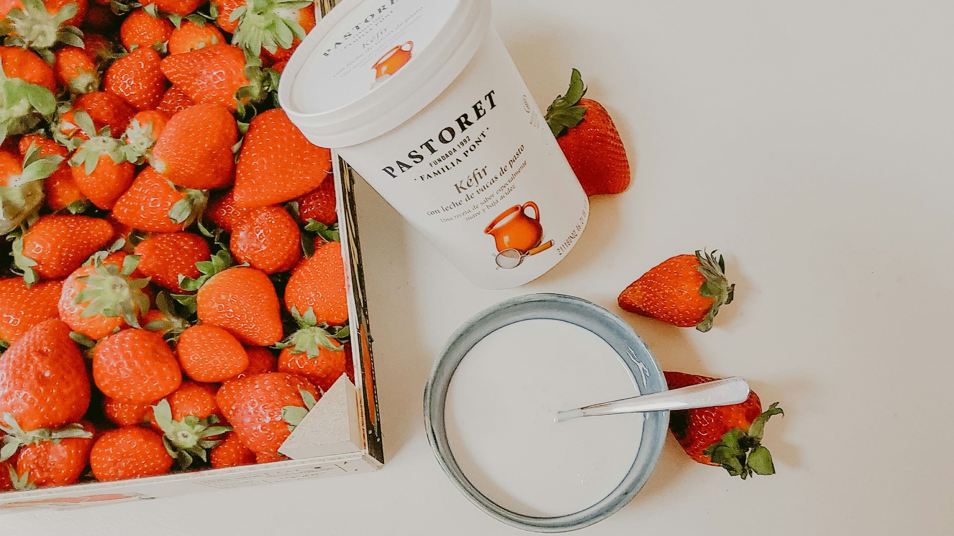 strawberries on white plastic cup