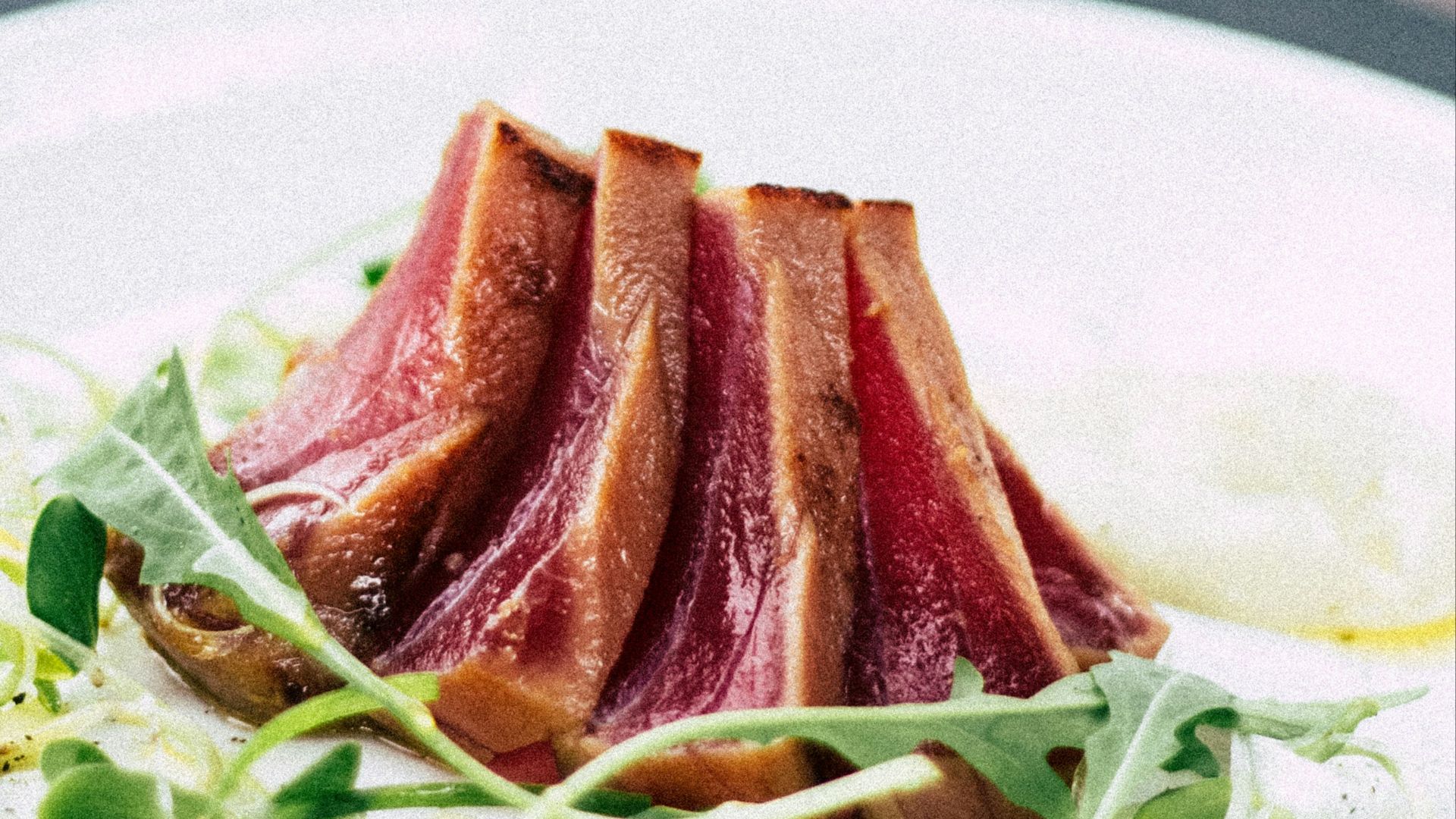 roasted meat served on ceramic plate