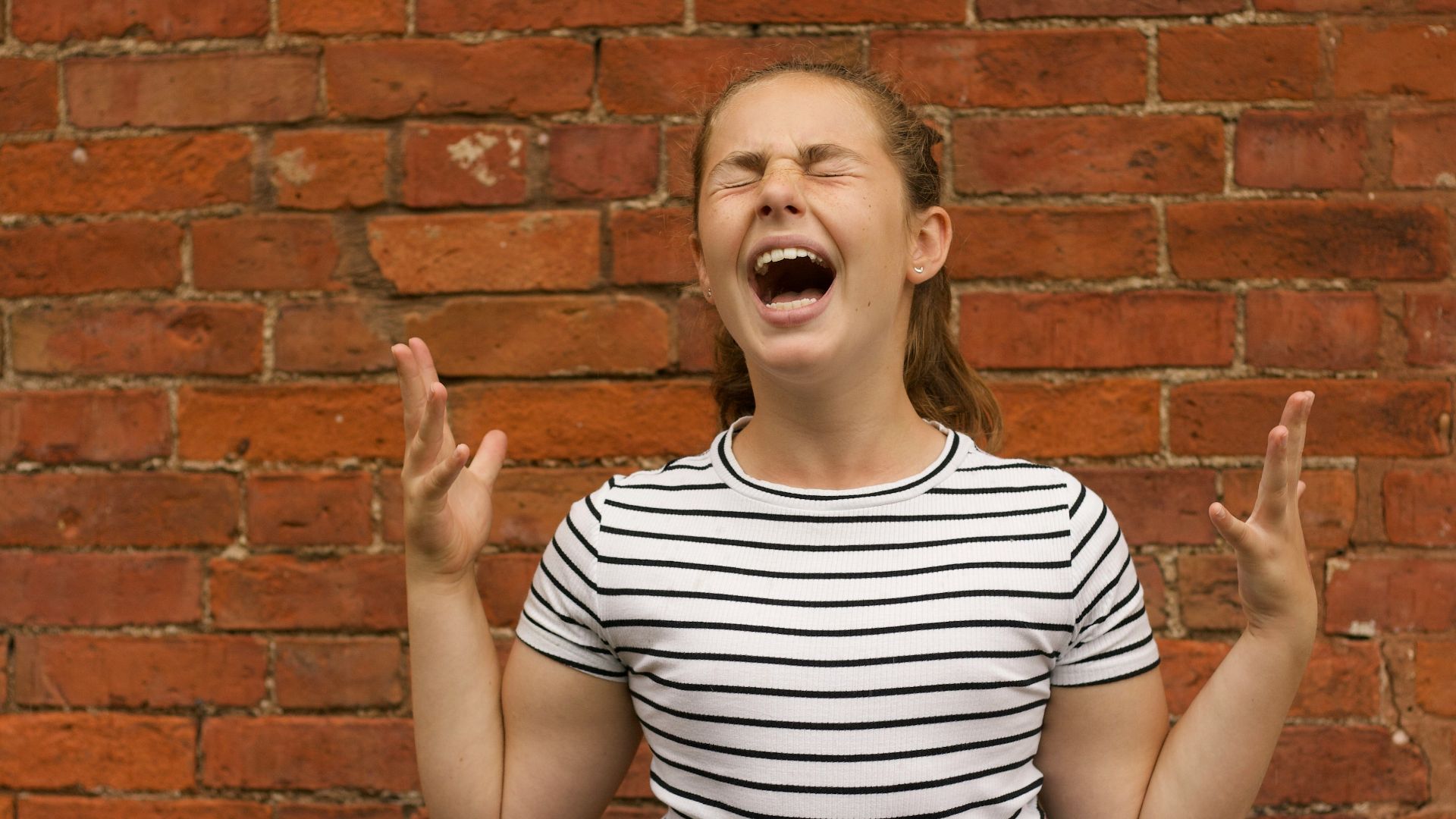 woman wearing black and white striped shirt