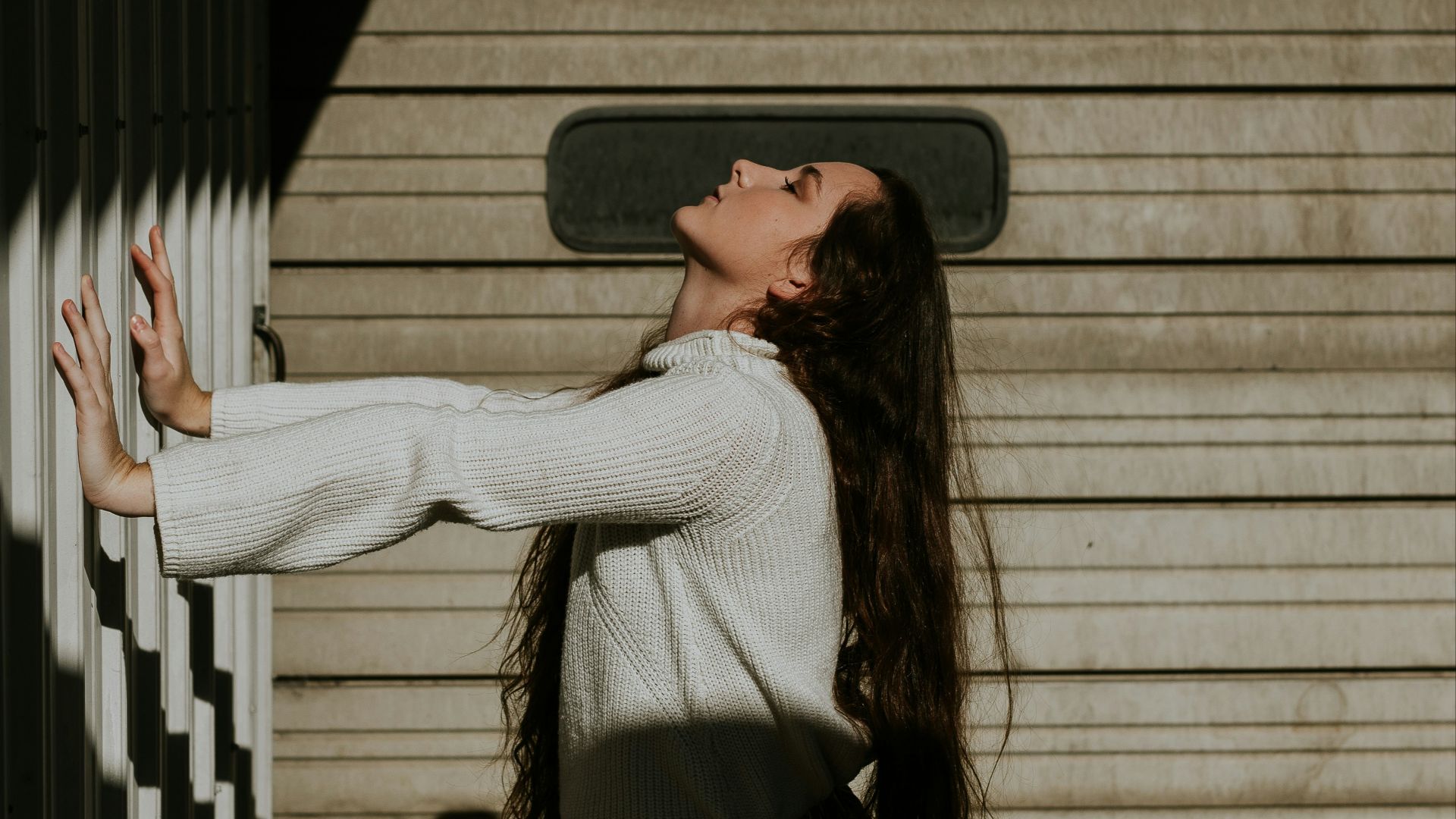 woman holding galvanized iron sheet