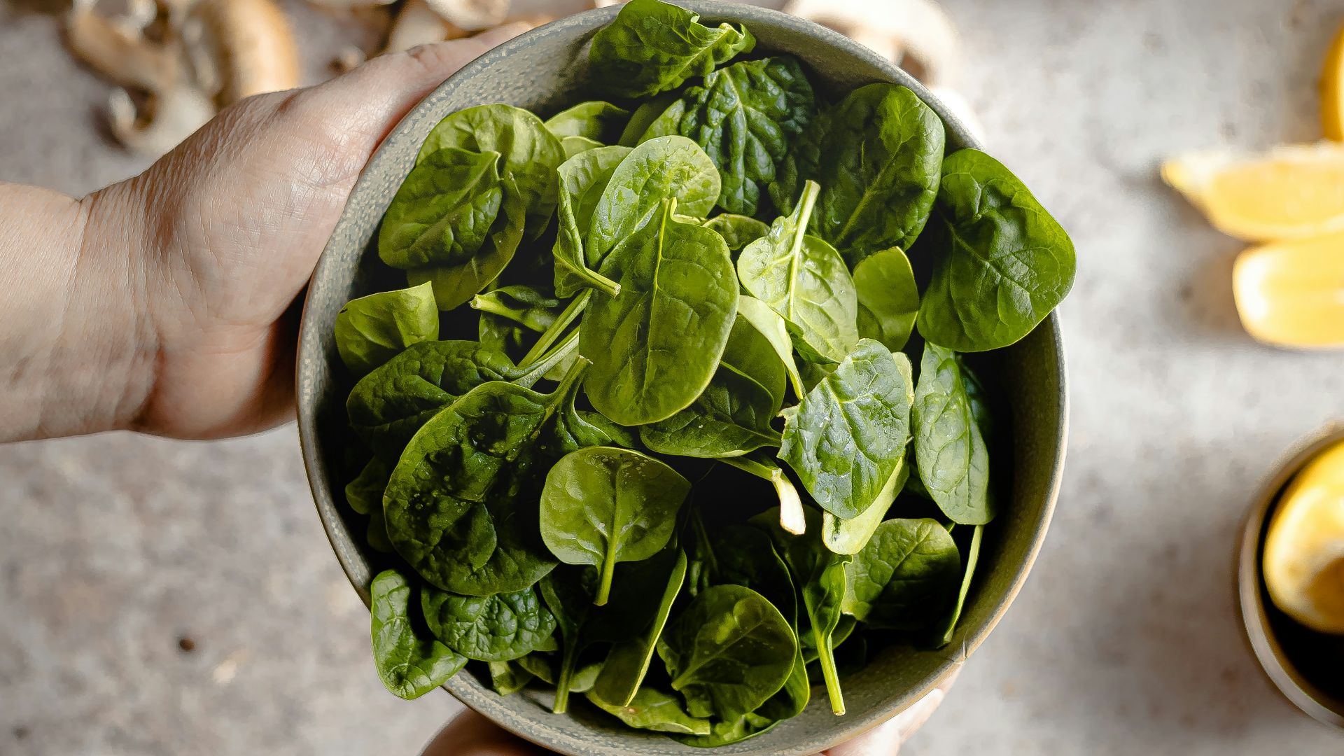 green leaves on white ceramic bowl