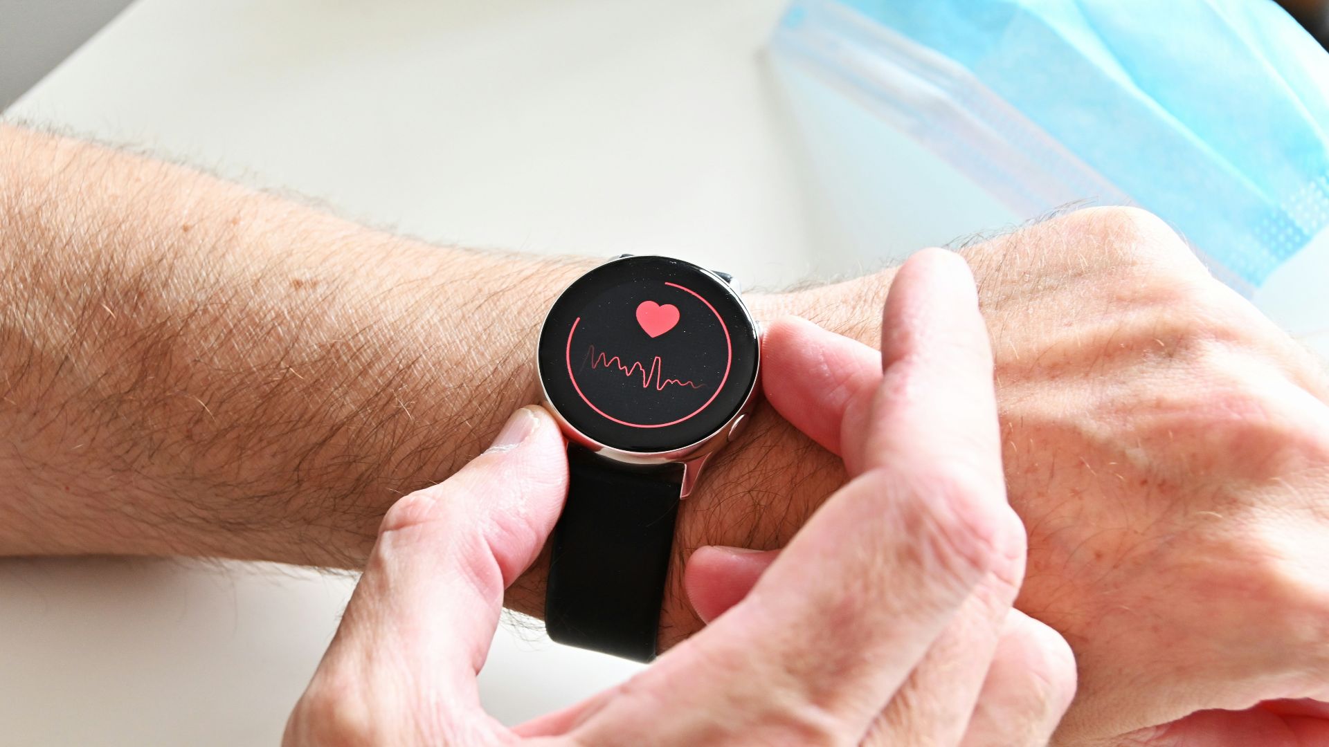 a person holding a stopwatch