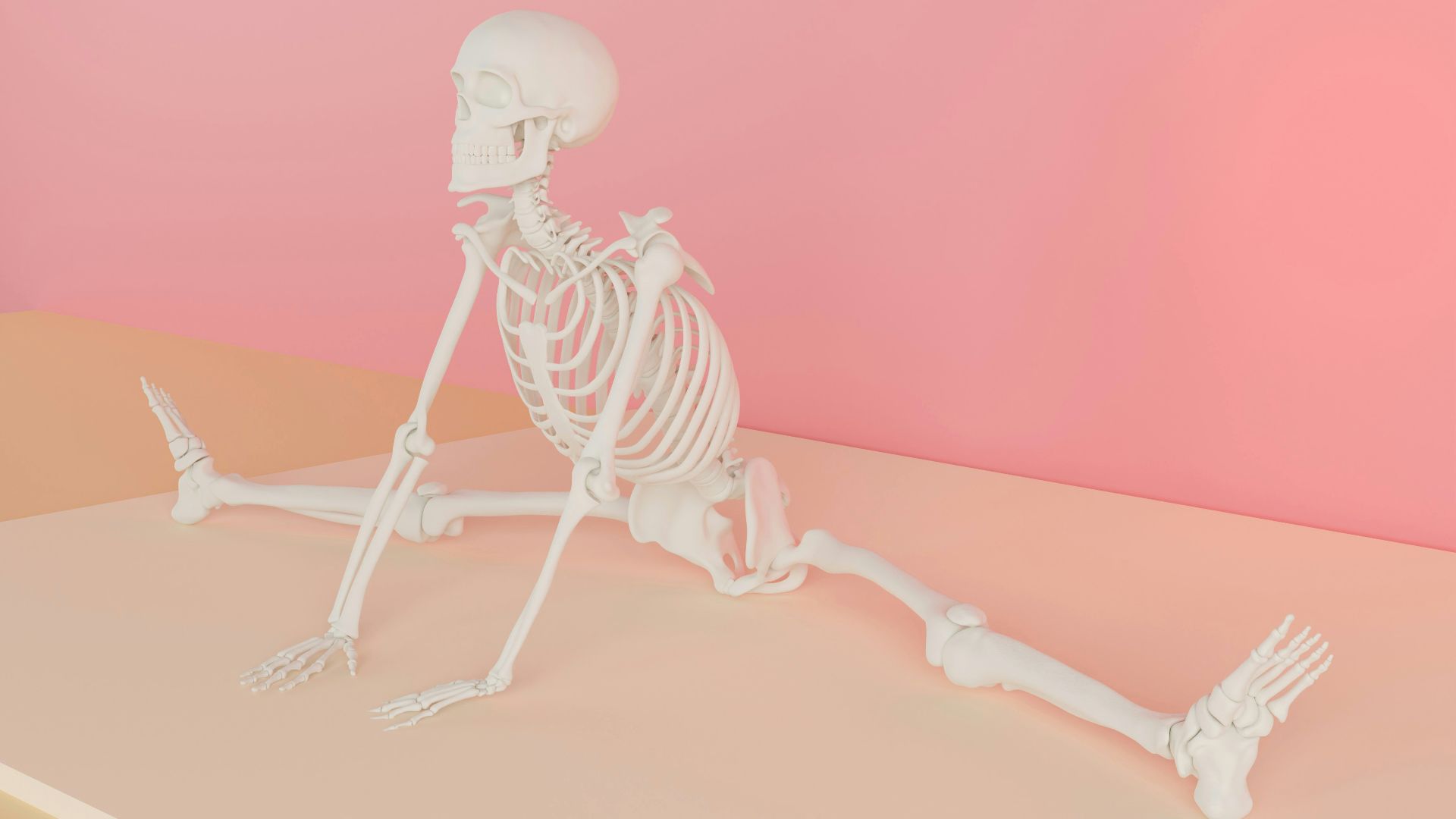 a skeleton sitting on top of a table next to a pink wall
