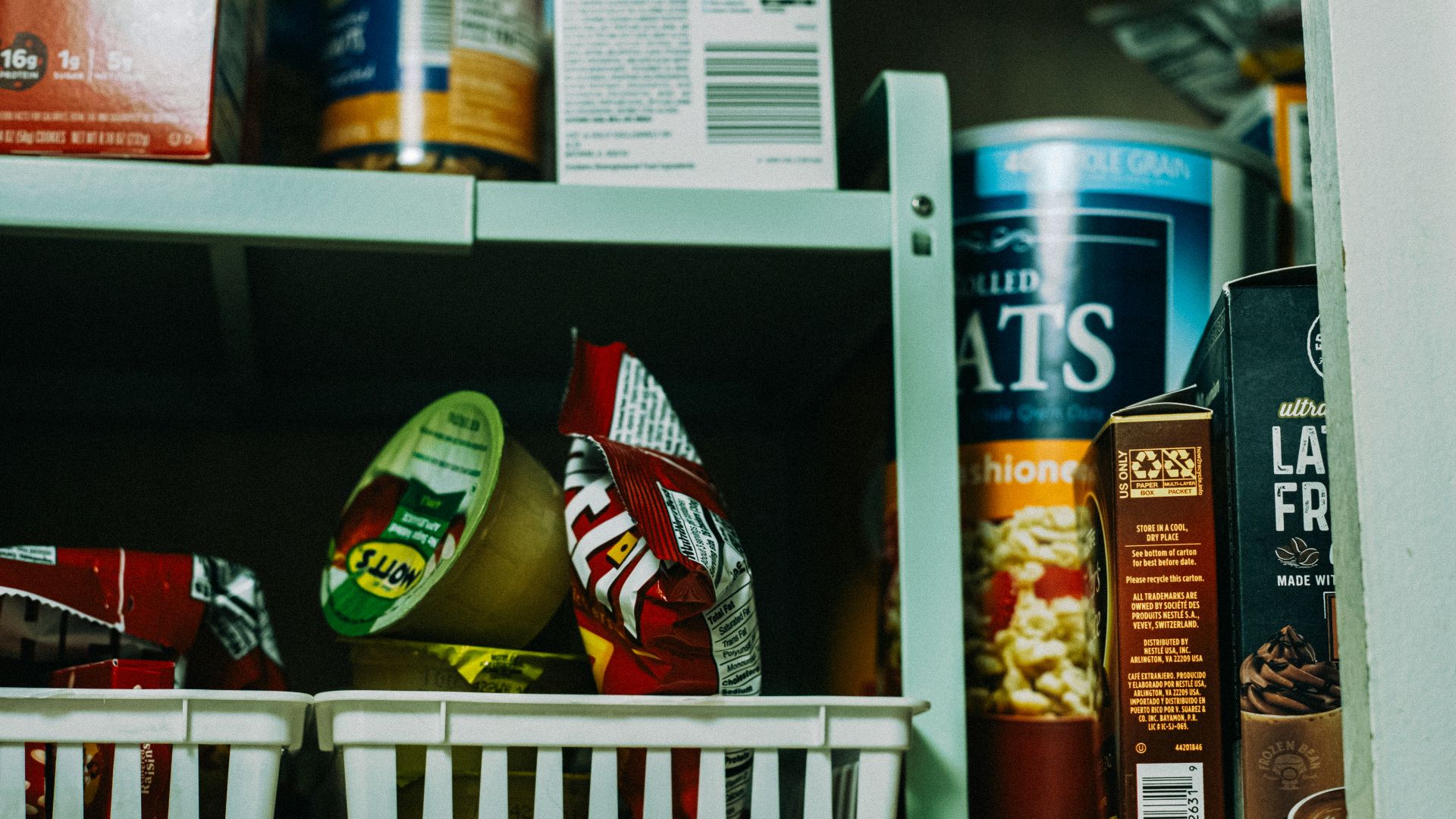 a shelf filled with lots of different types of food
