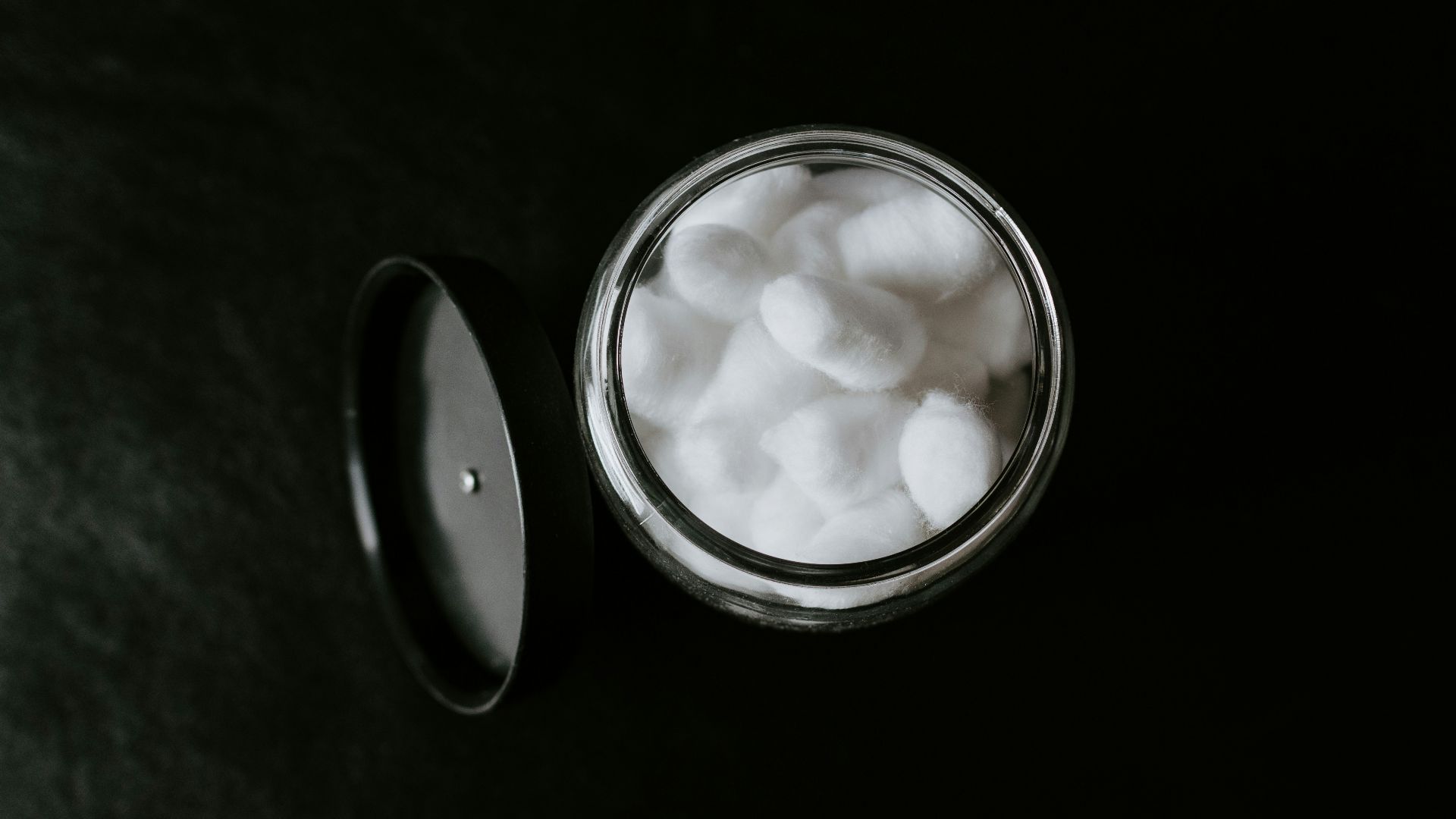 white round container with white liquid