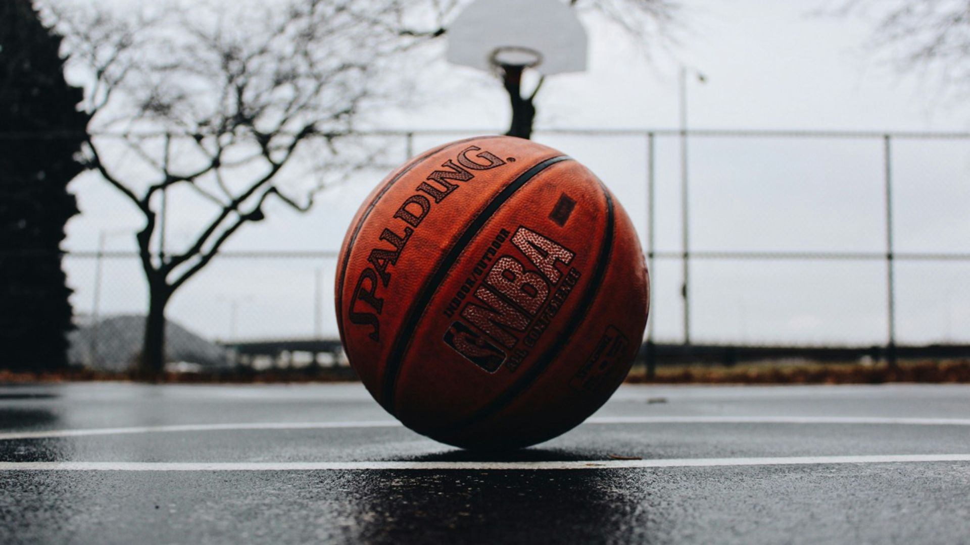 Spalding basketball in court