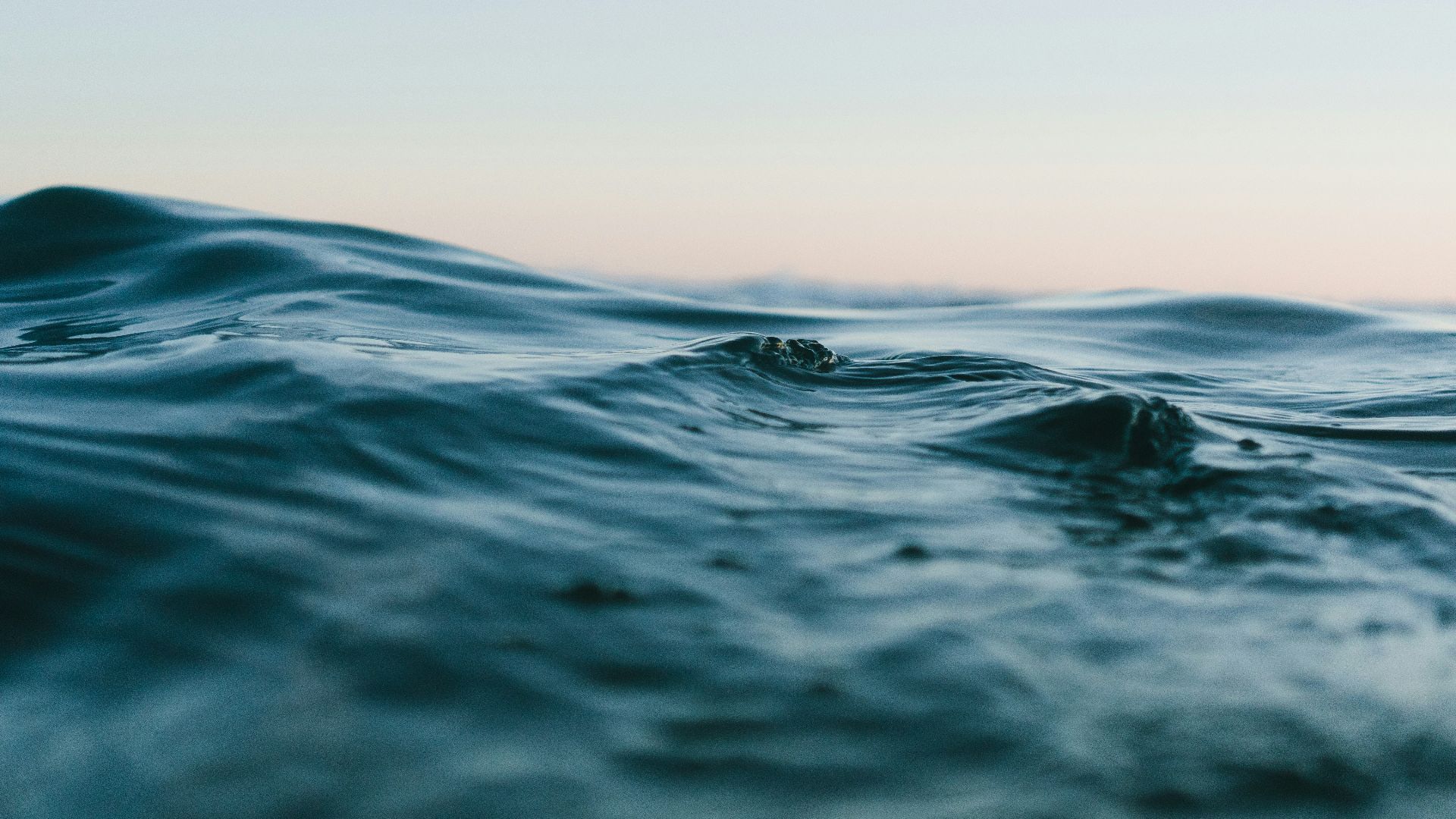 body of water under sky