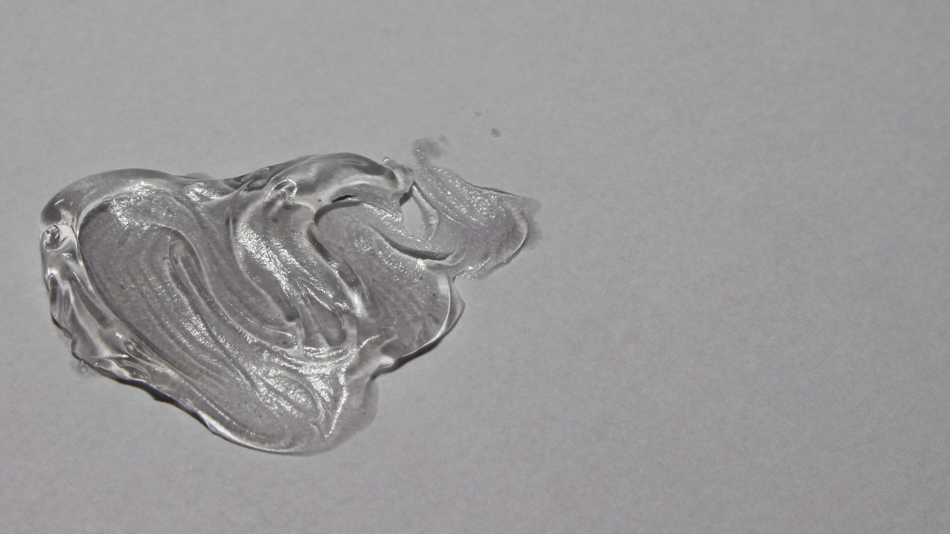 a close up of a metal object on a white surface