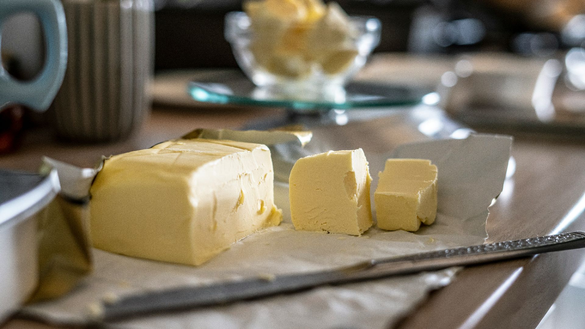sliced cheese on clear glass plate