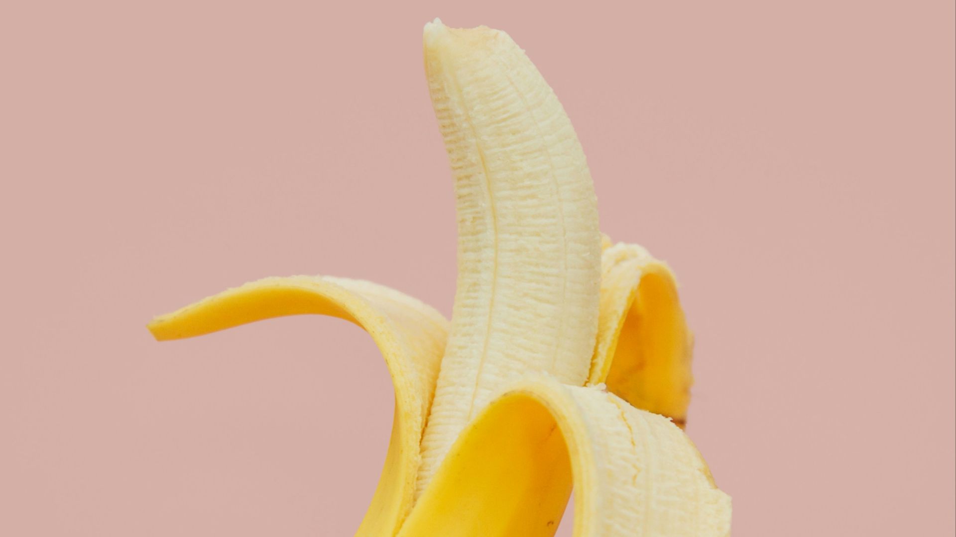 half peeled banana fruit