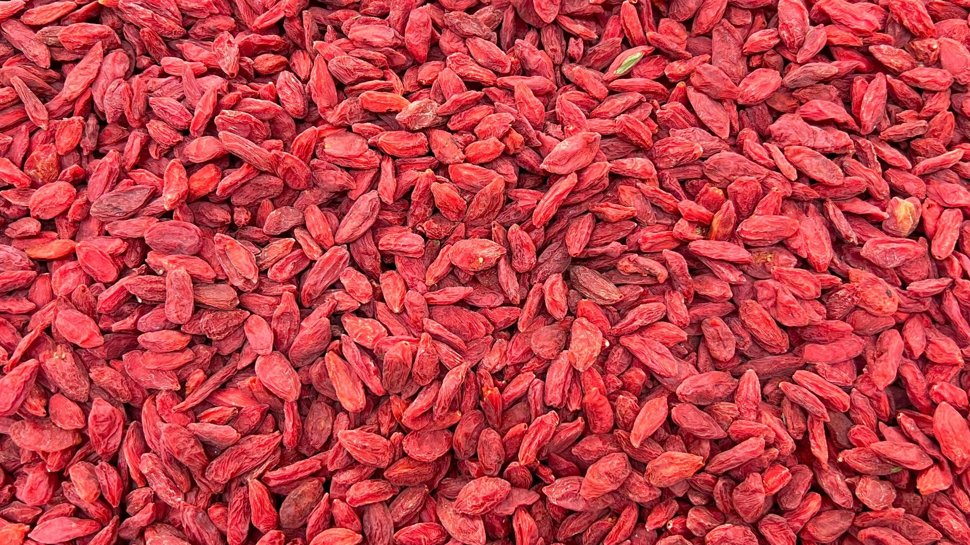 a large pile of red gourmet food