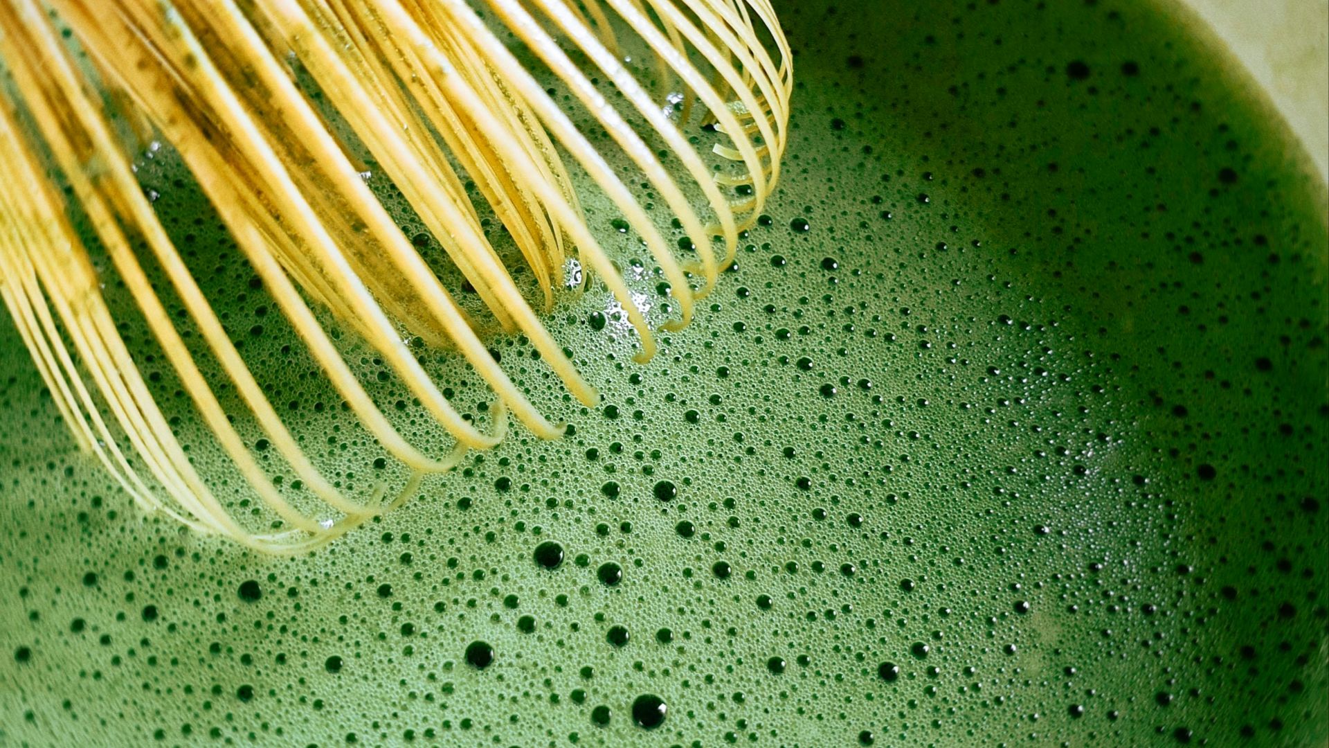 white coated wire on black surface