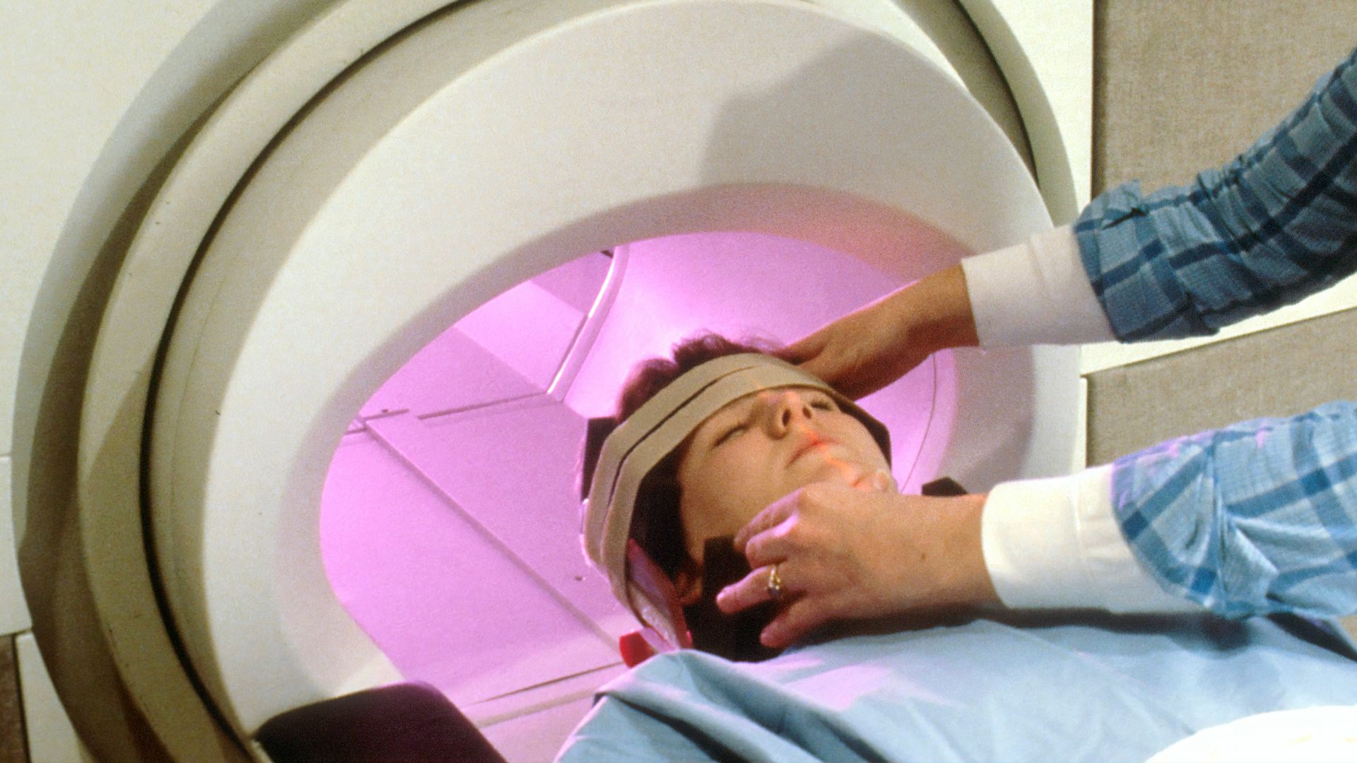 person in blue denim jeans lying on bed